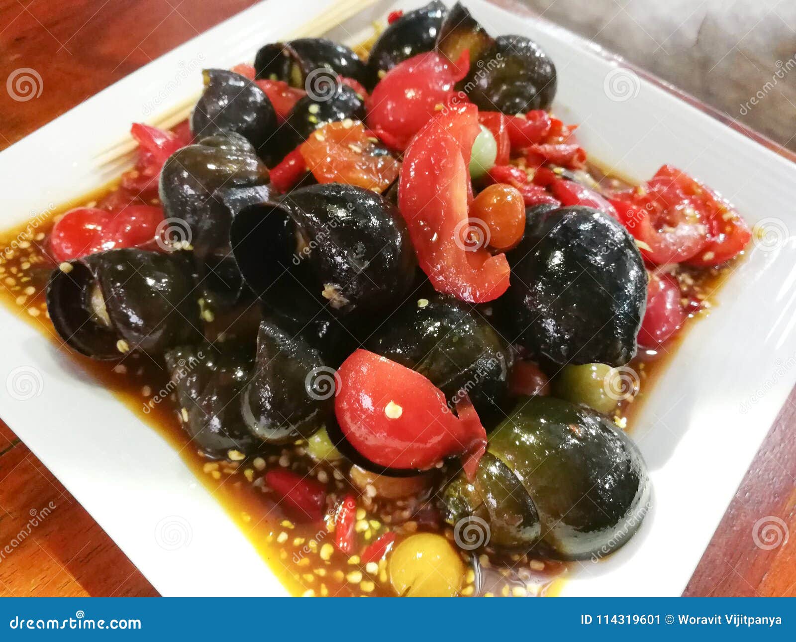 Spicy Salad apple snail stock image. Image of apple 114319601