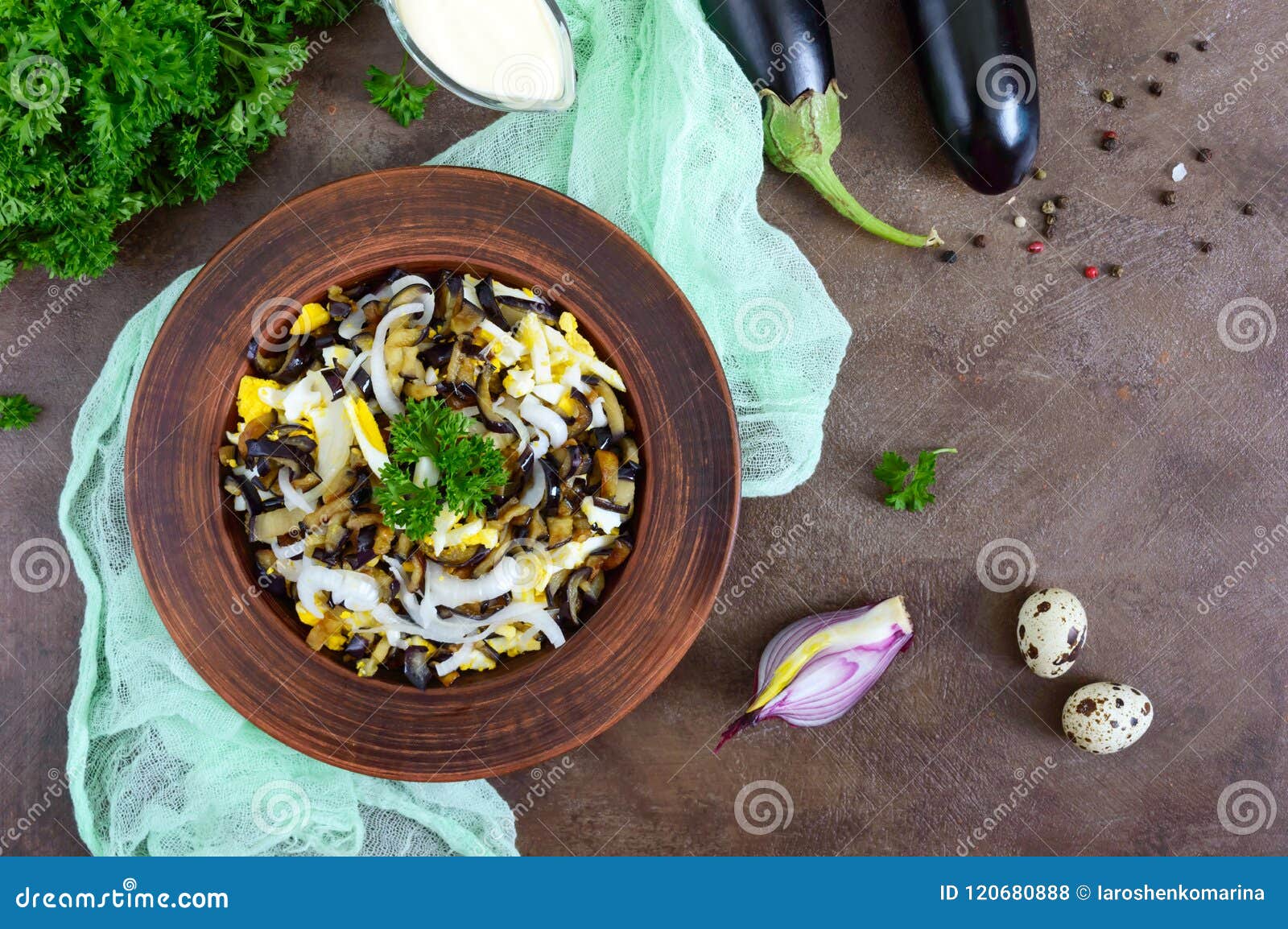 Spicy Salad of Fried Eggplant, Boiled Egg, Marinated Onions in a Bowl