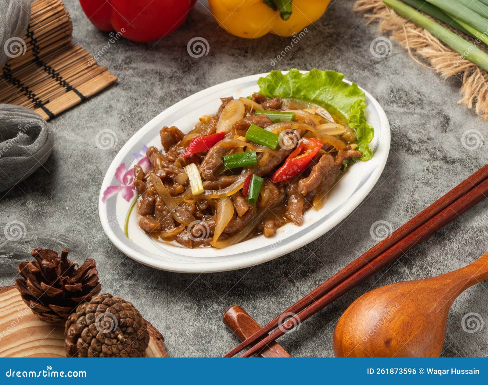 Spicy Scallion Beef with Chopsticks Served in Dish Isolated Table Top ...