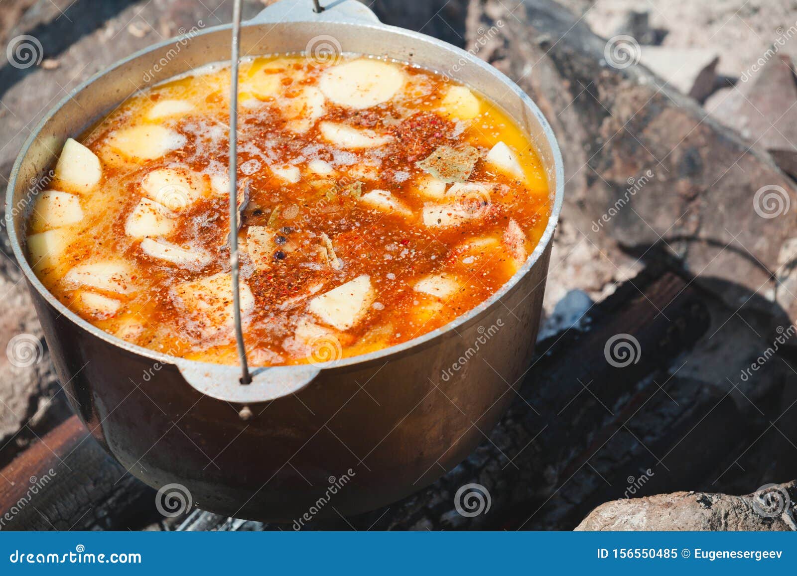 Spicy soup in a cauldron stock image. Image of summer 156550485