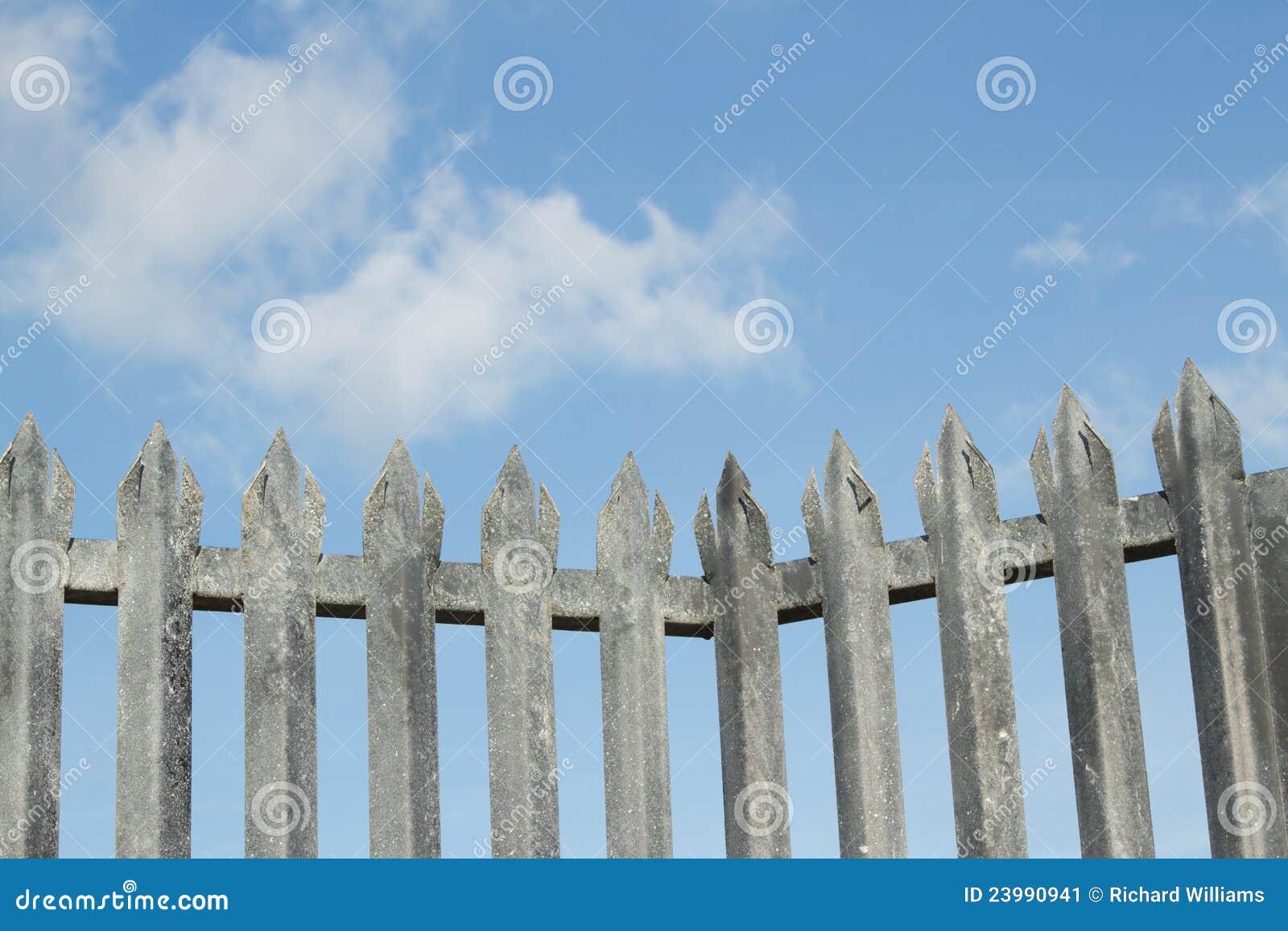 Spike fence. stock image. Image of blue, railing, posts - 23990941
