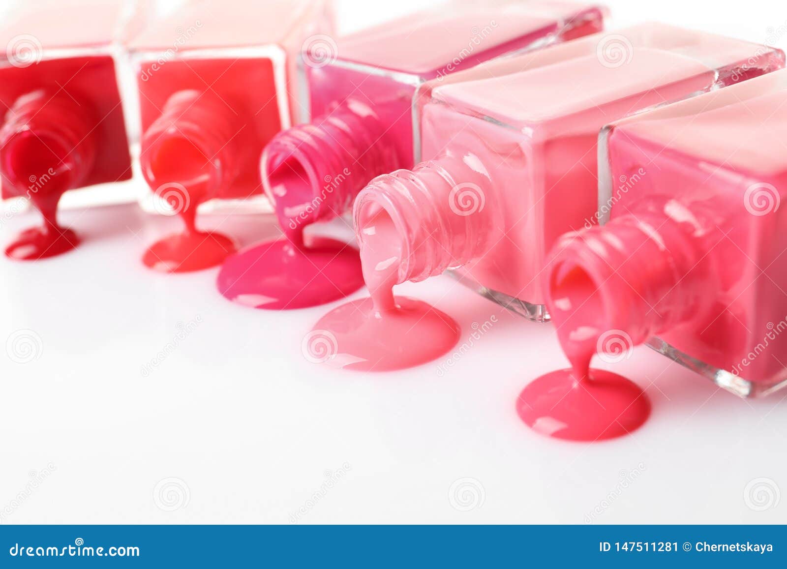 Spilled Different Nail Polishes With Bottles On White Background Stock Image Image of fashion