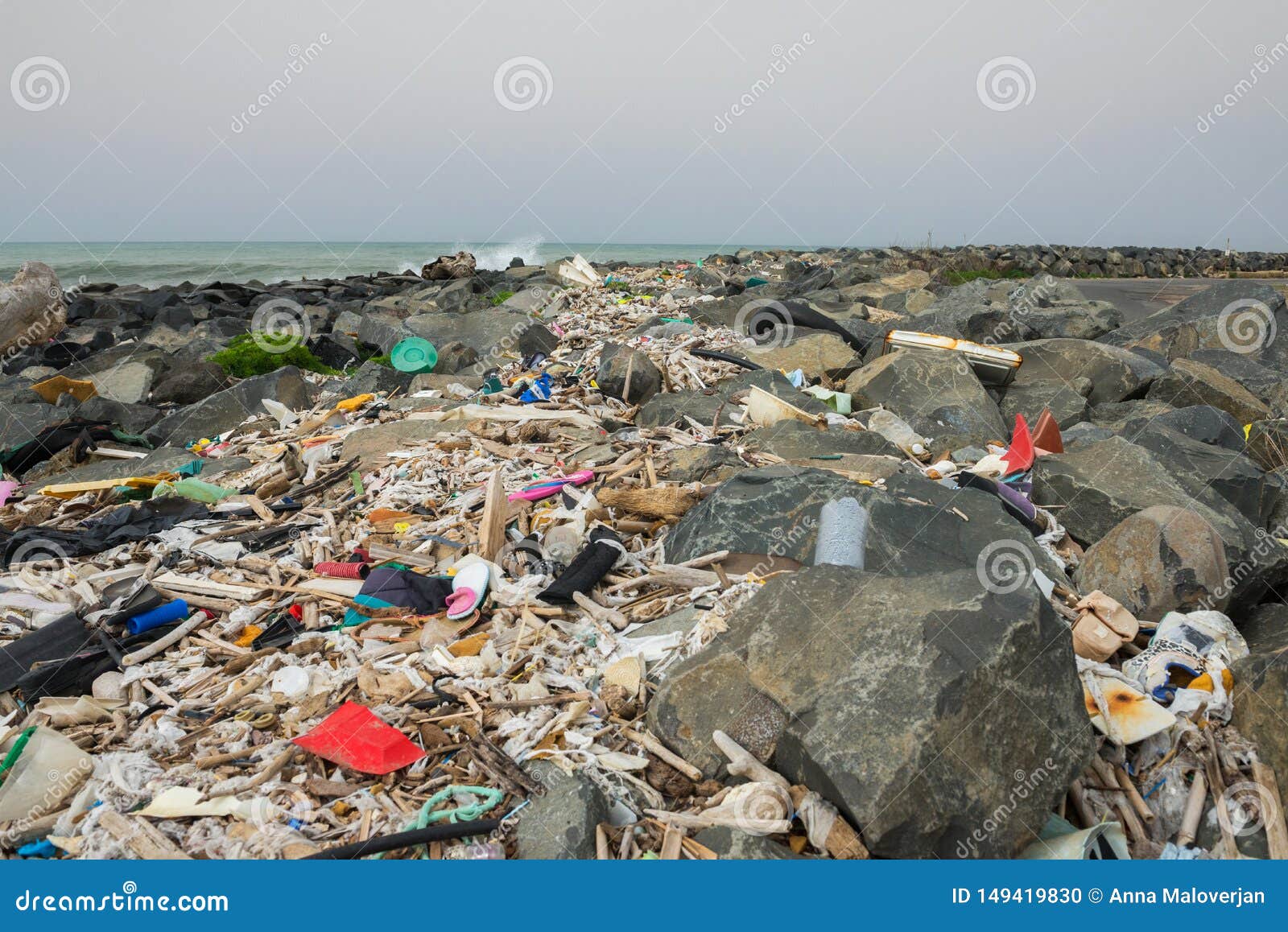 Spilled Garbage on the Beach Near the Big City. Empty Used Dirty ...