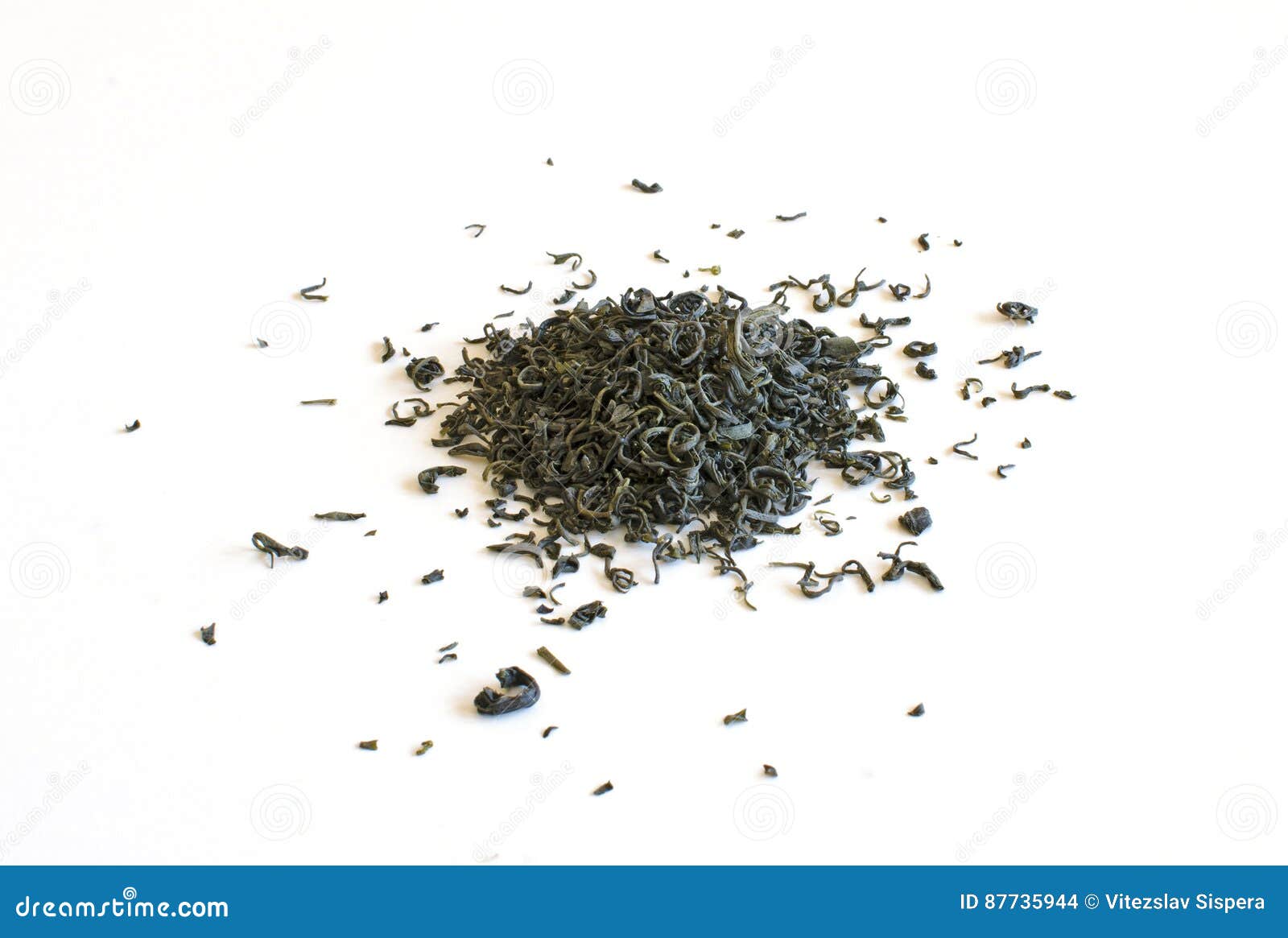 Spilled green tea leaves stock photo. Image of background 87735944