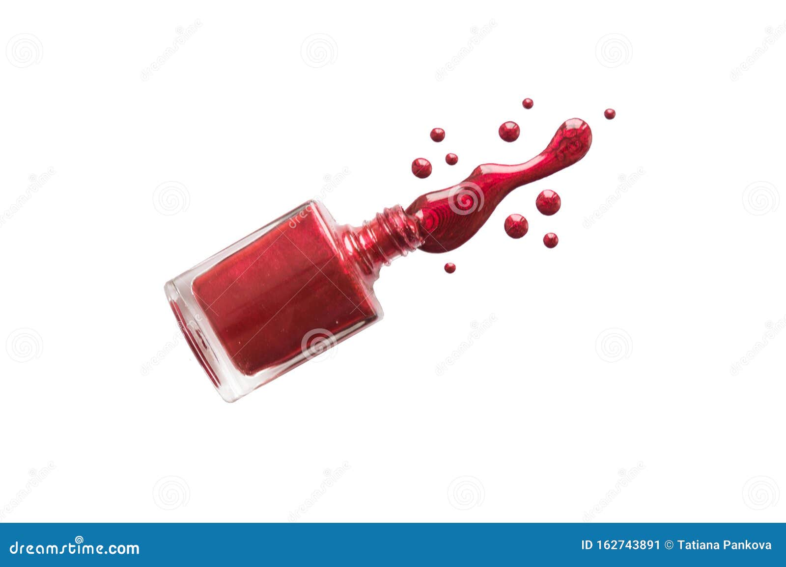 Spilled Nail Polish and Bottle on White Background. Drops of Liquid
