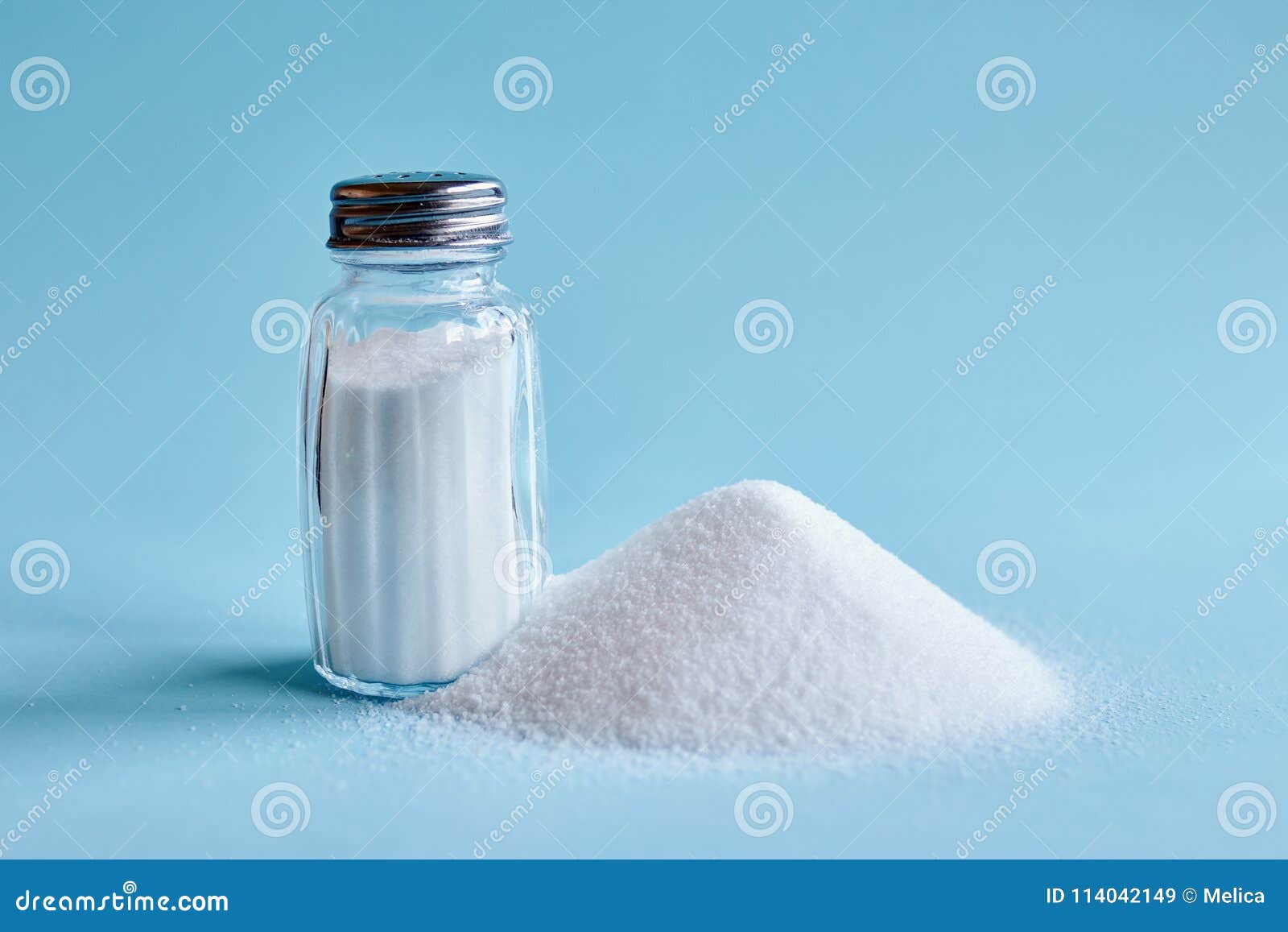 spilled salt and salt shaker