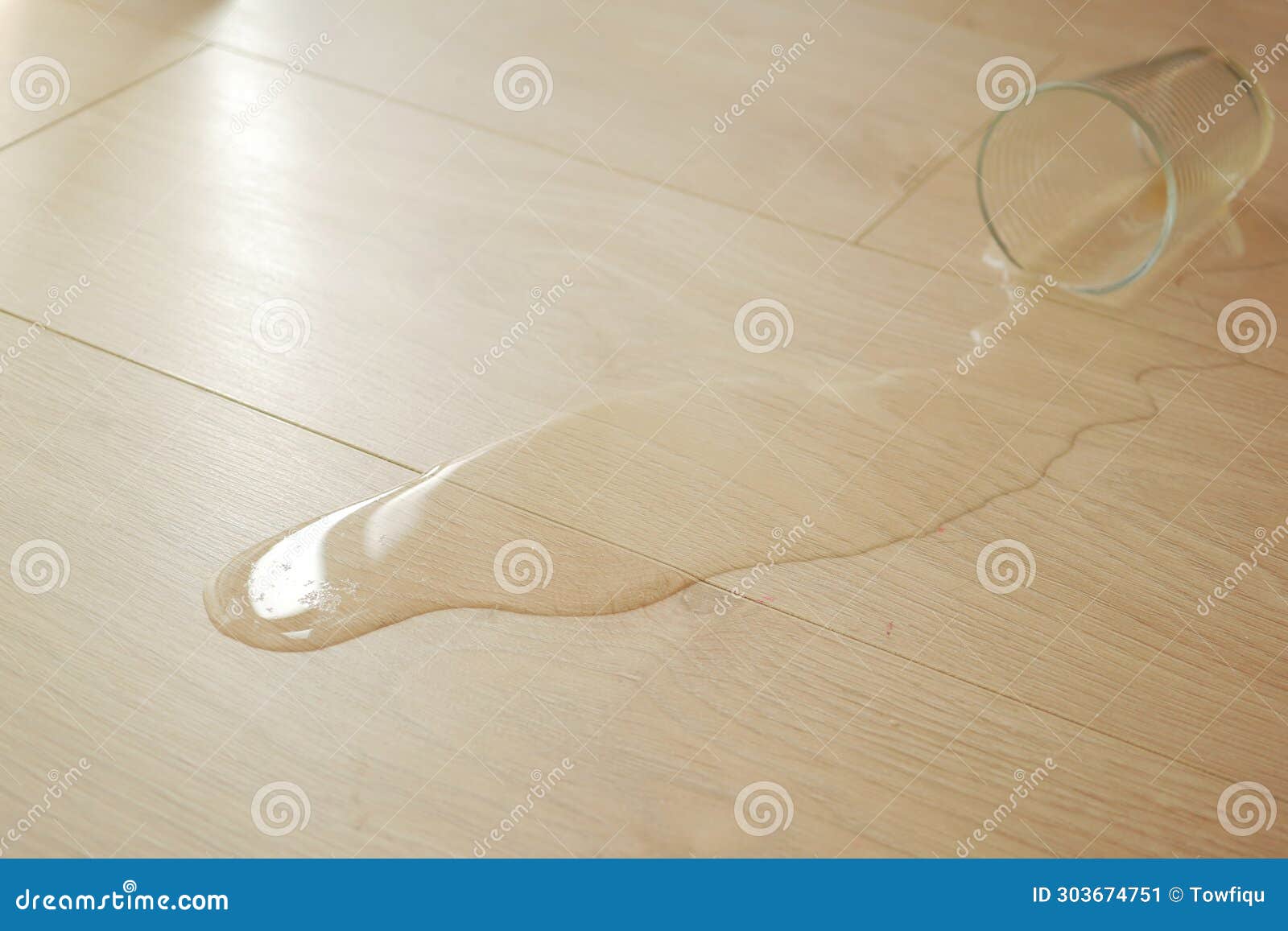 Spilled Water Drops on Wooden Laminate Floor. Stock Image Image of