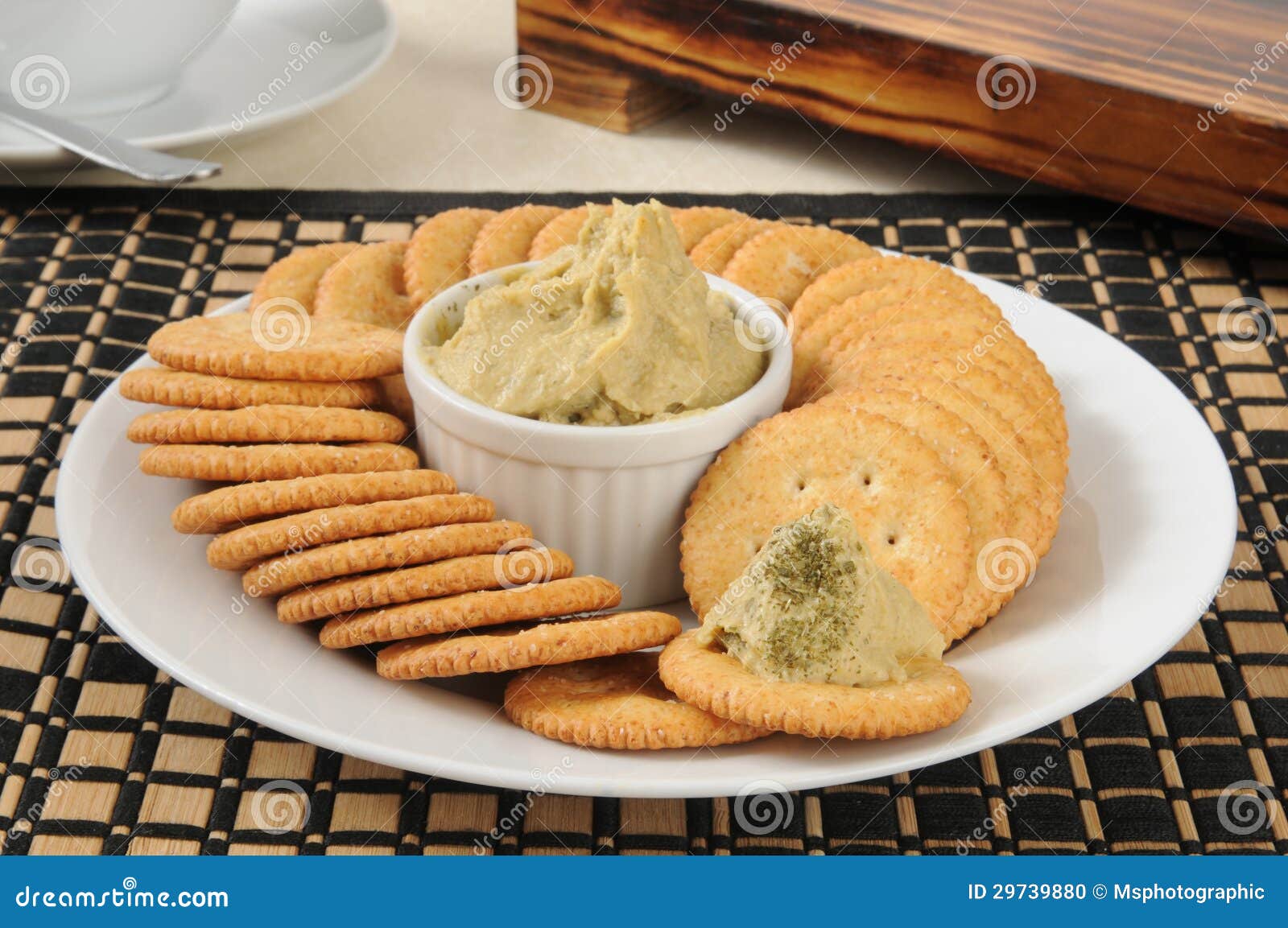 Hummus on crackers stock photo. Image of spread, food 29739880