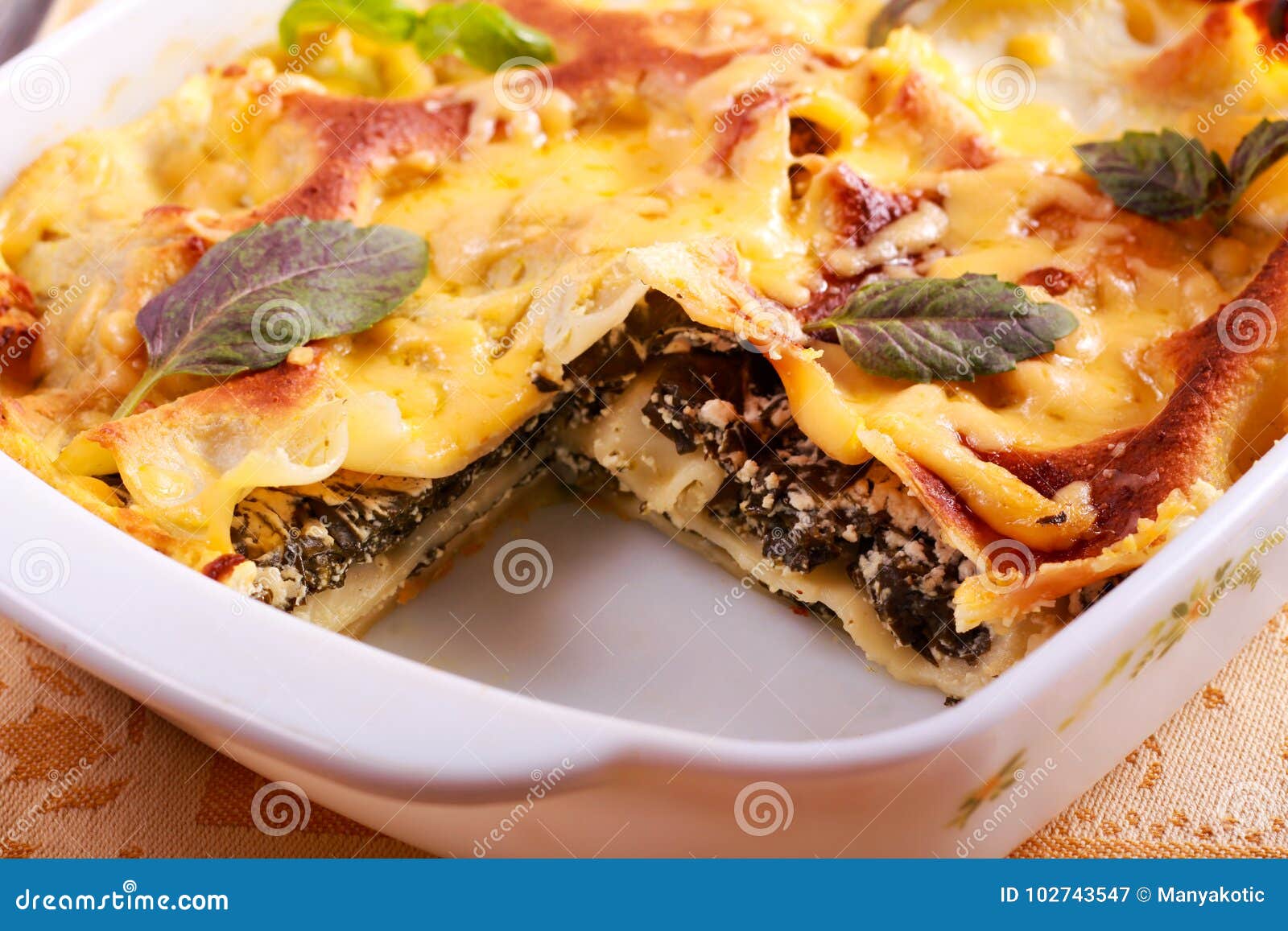 Spinach and cheese lasagna stock image. Image of herbs - 102743547