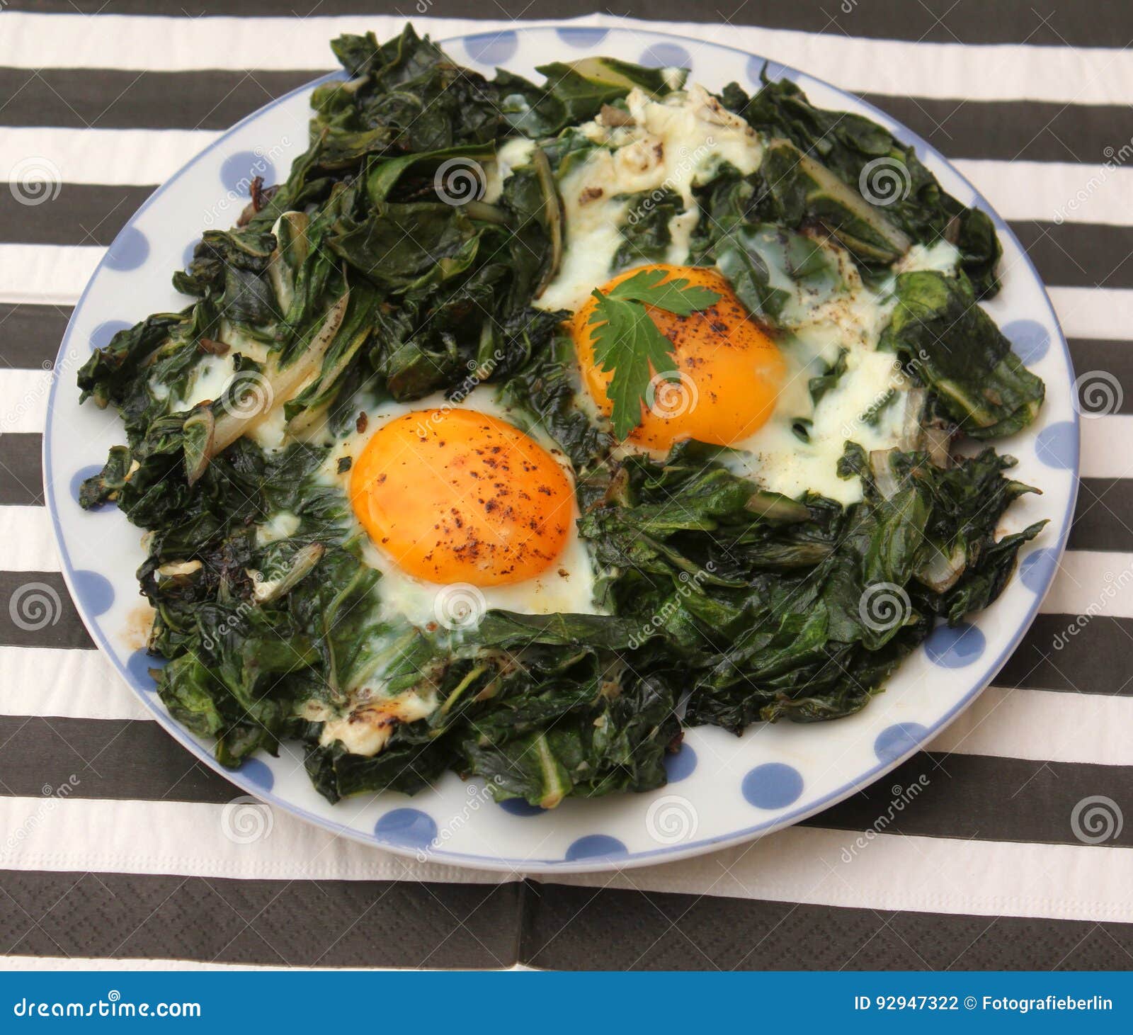 Spinach with Eggs stock photo. Image of green, garlic 92947322