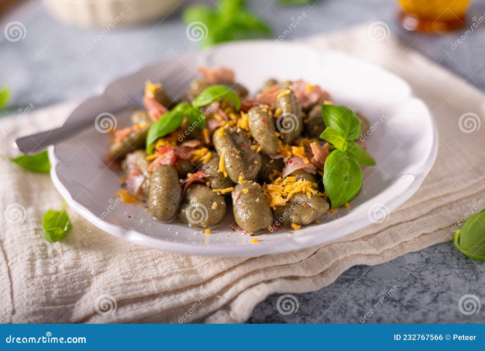 Spinach gnocchi with ham stock photo. Image of cooking 232767566