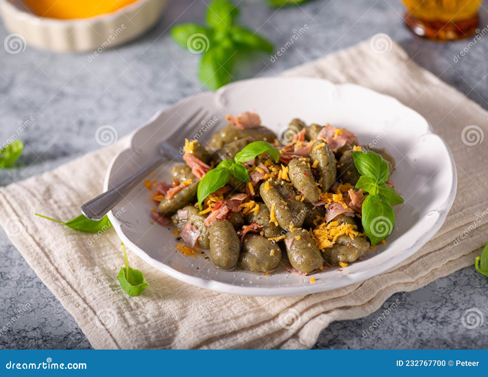 Spinach gnocchi with ham stock photo. Image of nutrition 232767700