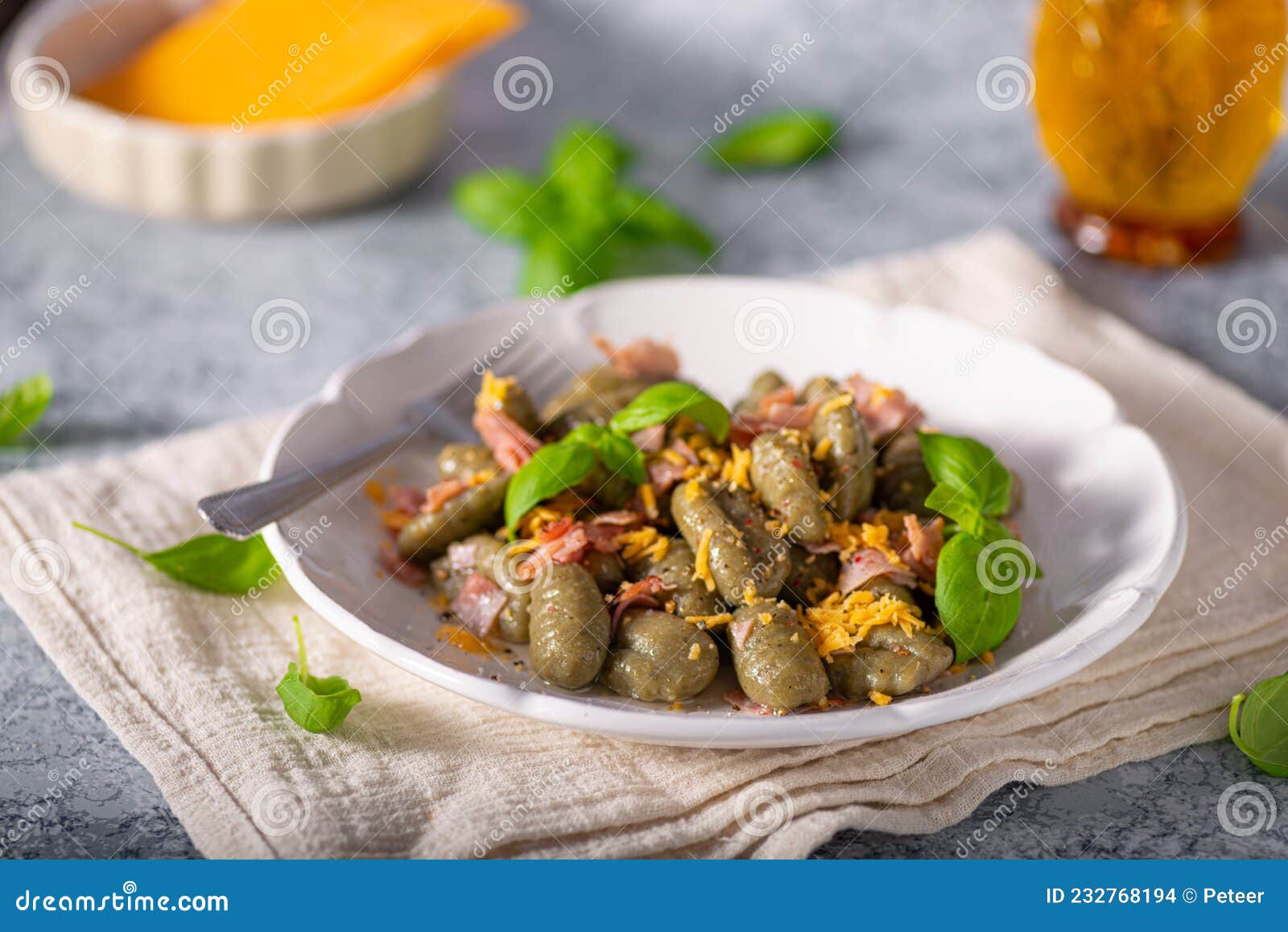 Spinach gnocchi with ham stock photo. Image of cheese 232768194