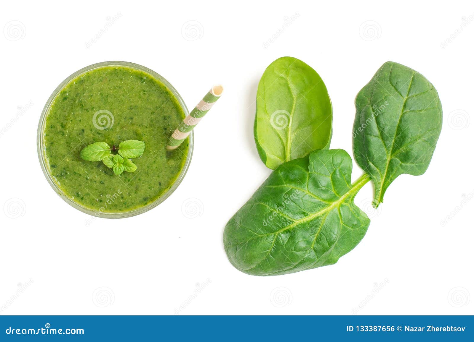 spinach smoothies. healthy green juice iwith spinach leaves solated on white background. top view