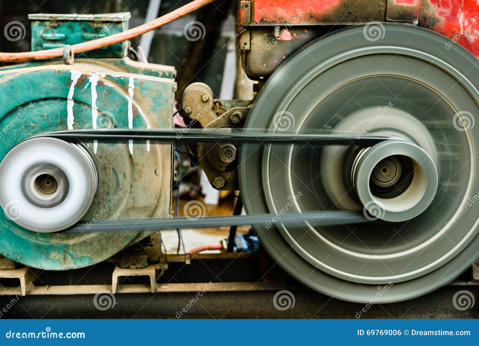 Spinning belt motor engine stock photo. Image of belt 69769006