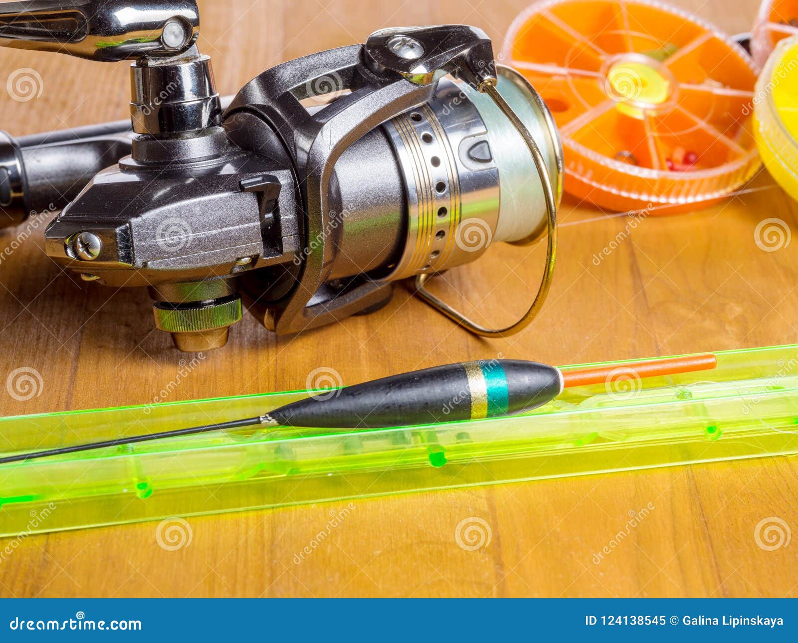 Spinning Coil and Float. Fishing Gear Stock Image - Image of spoon, lake:  124138545