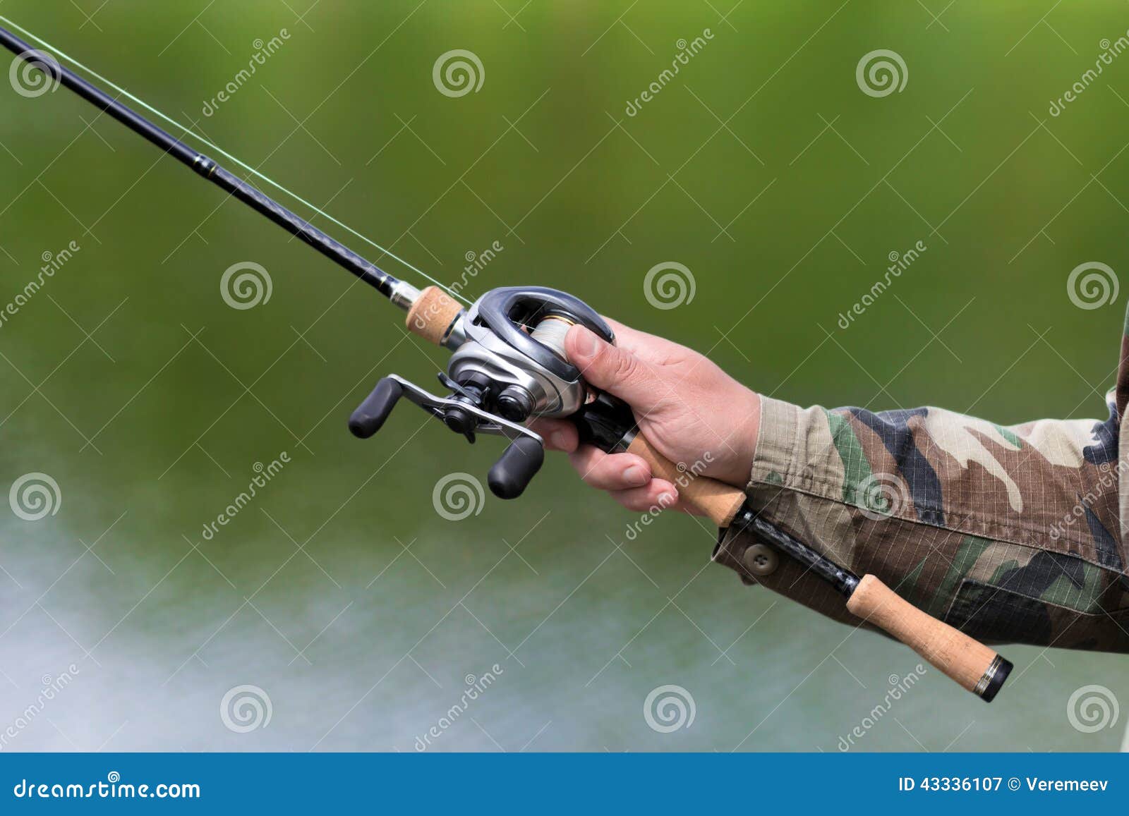 Spinning reel and casting stock image. Image of cork 43336107