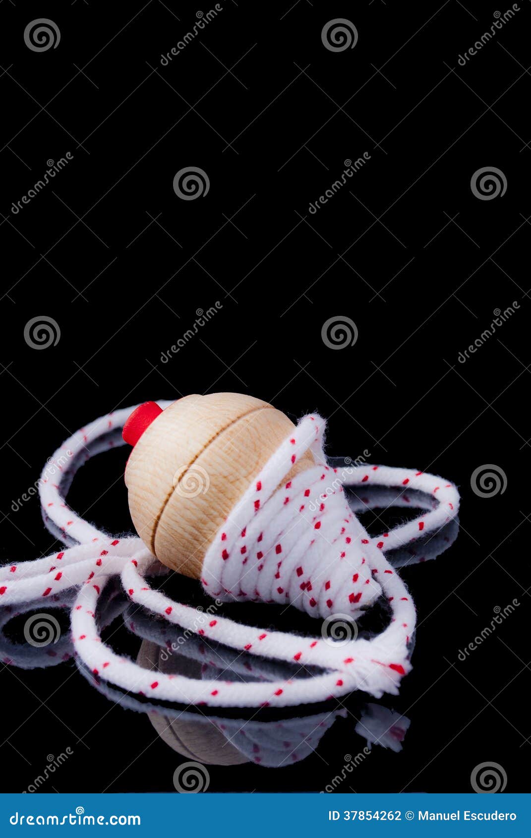 Spinning Top with Rope on Black Background Stock Photo Image of