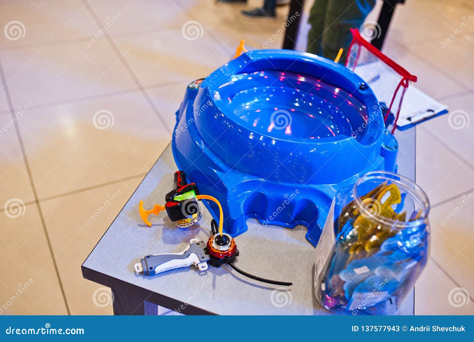 Spinning Tops on Bright Blue Battle Arena Stock Image Image of