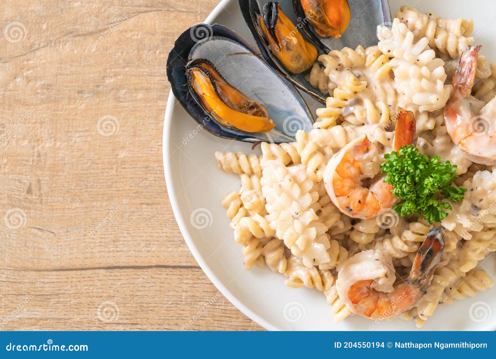 Spiral Pasta Mushroom Cream Sauce with Seafood Stock Photo - Image of