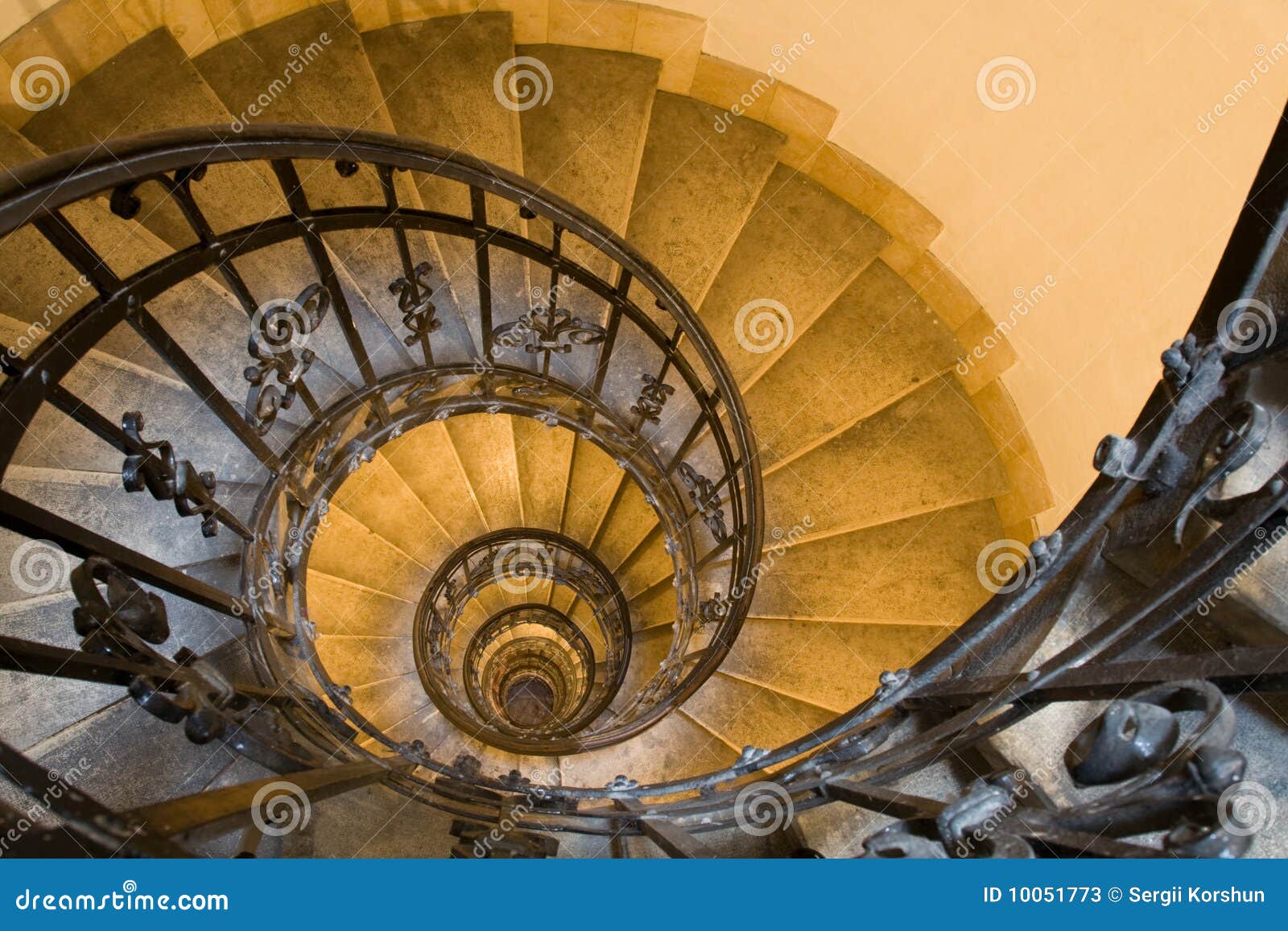 spiral staircase and stone steps in old tower