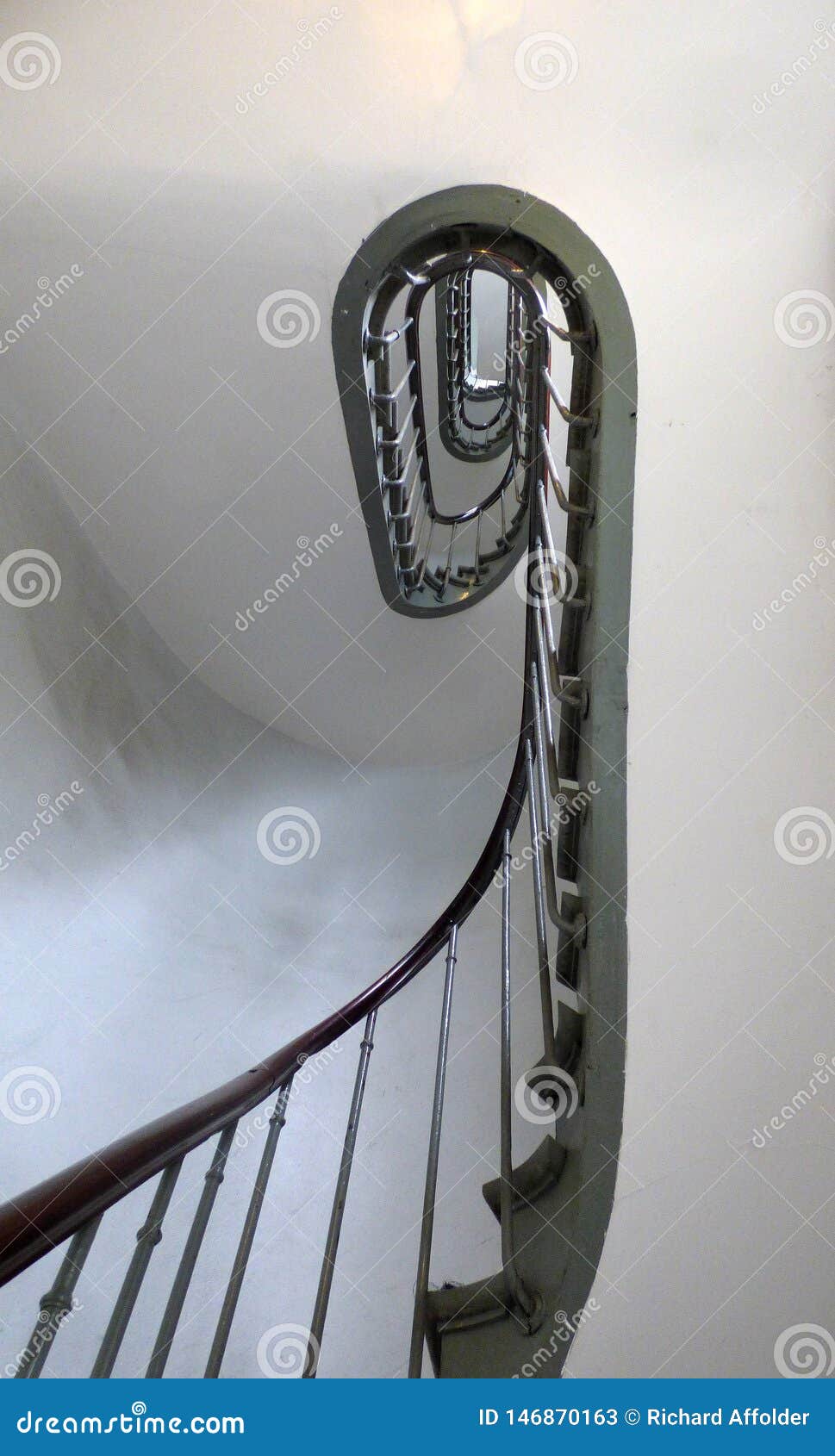 A Spiral Wrought Iron Staircase In An Apartment Building Stock Image Image Of Wrought White 146870163