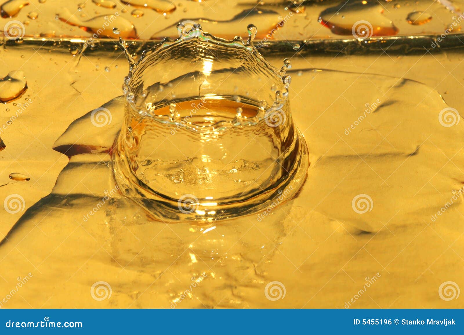 splash of yellow liquid