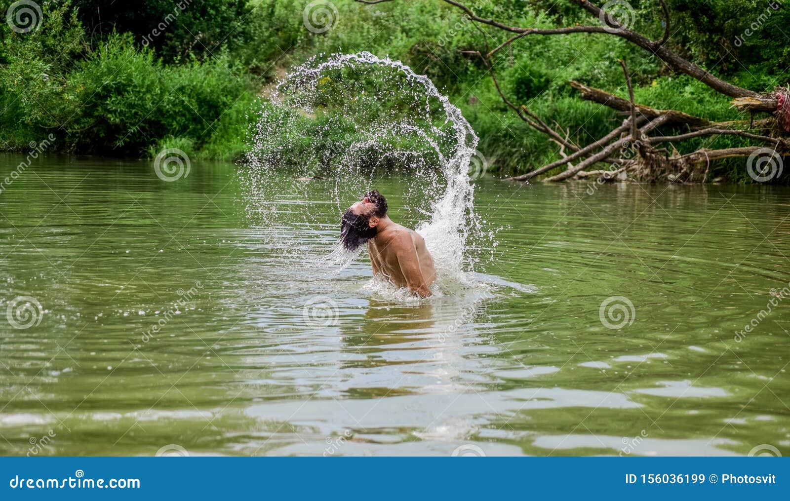 splashes of freedom. relaxation and rest. swimming sport. swimming skills. man enjoy swimming in river or lake. submerge