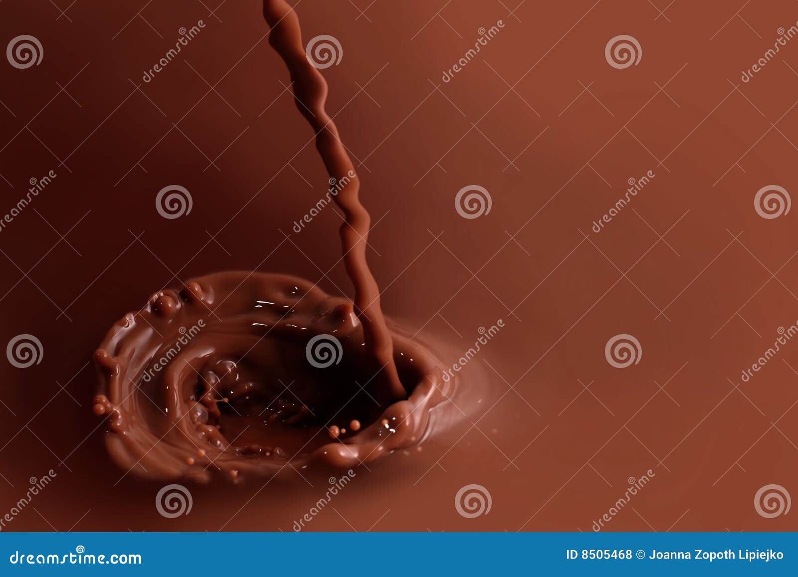 Macro shot of brown splashing chocolate