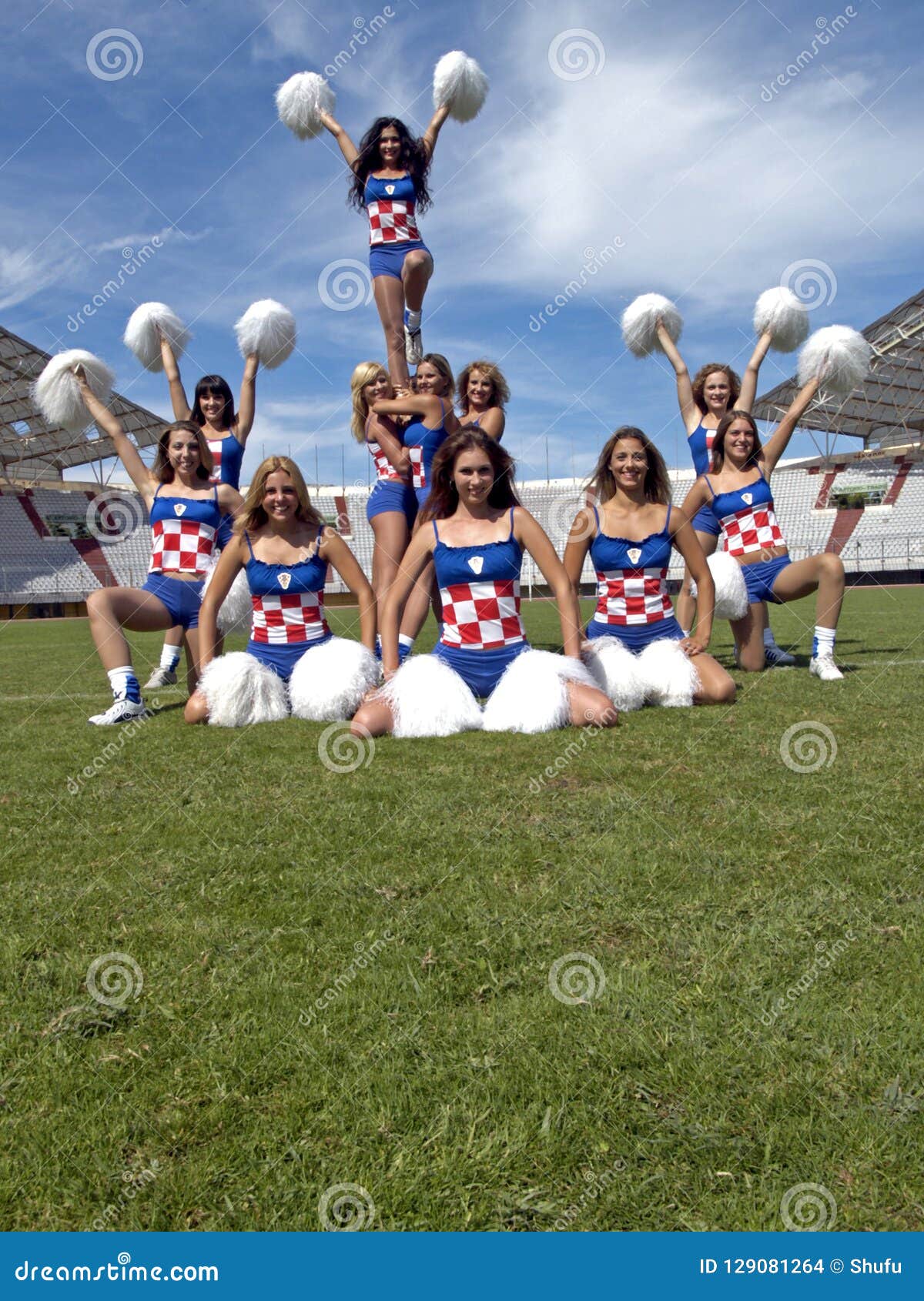 Cheerleaders Formation on the Grass Editorial Stock Image - Image