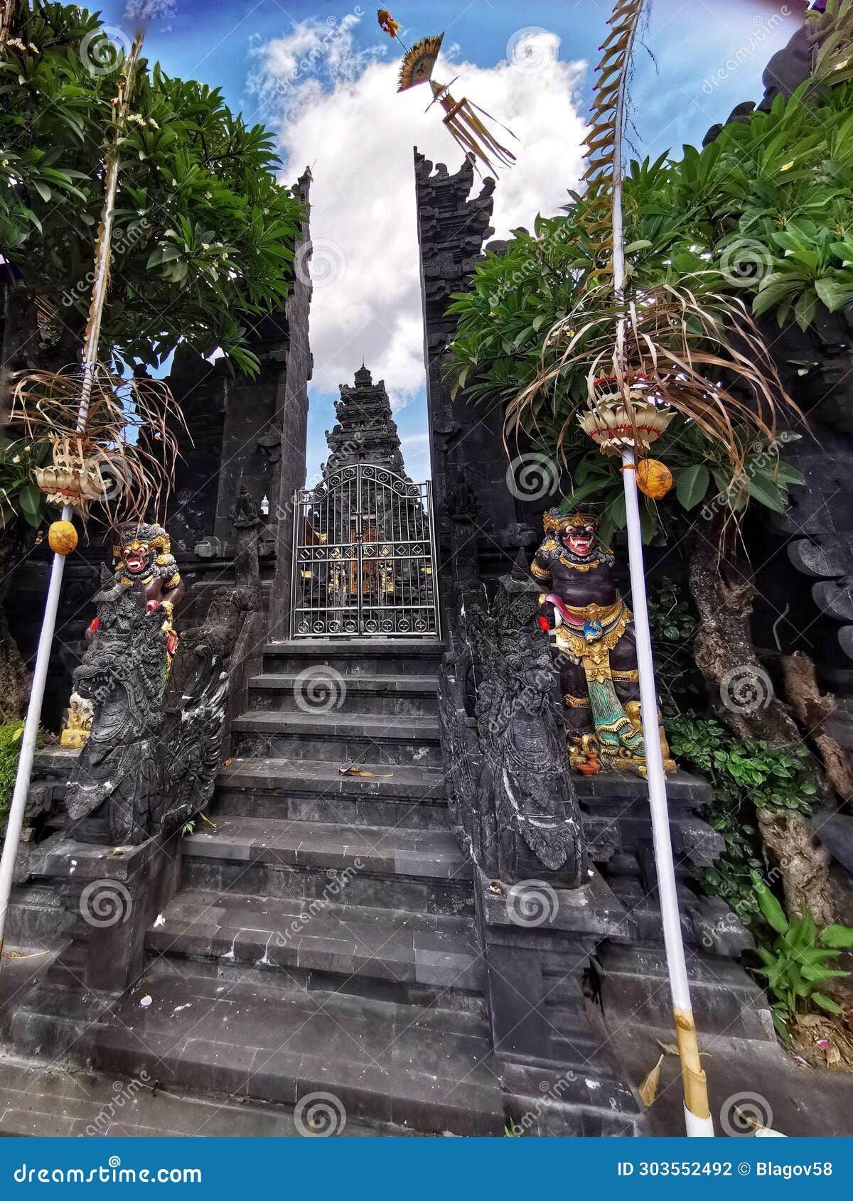 split gates at the batuan temple referred locally as pura puseh batuan on bali island in indonesia