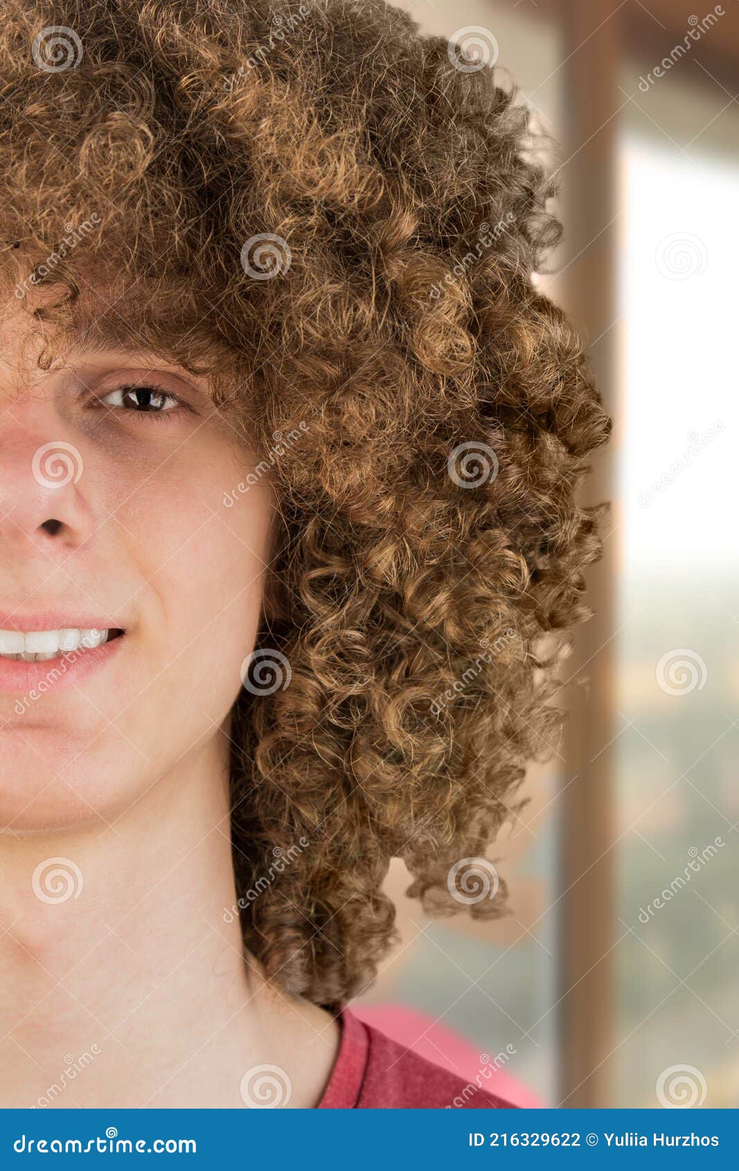 Split in Half Cropped Portrait of a Young Curly European Man with Long Curly  Hair and a Dreamy Smile Close-up Against the Window. Stock Photo - Image of  hairstyle, curly: 216329622