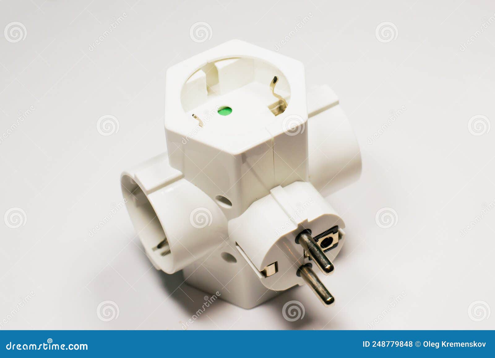 Splitter on a White Isolated Background. Electric Socket Stock Photo