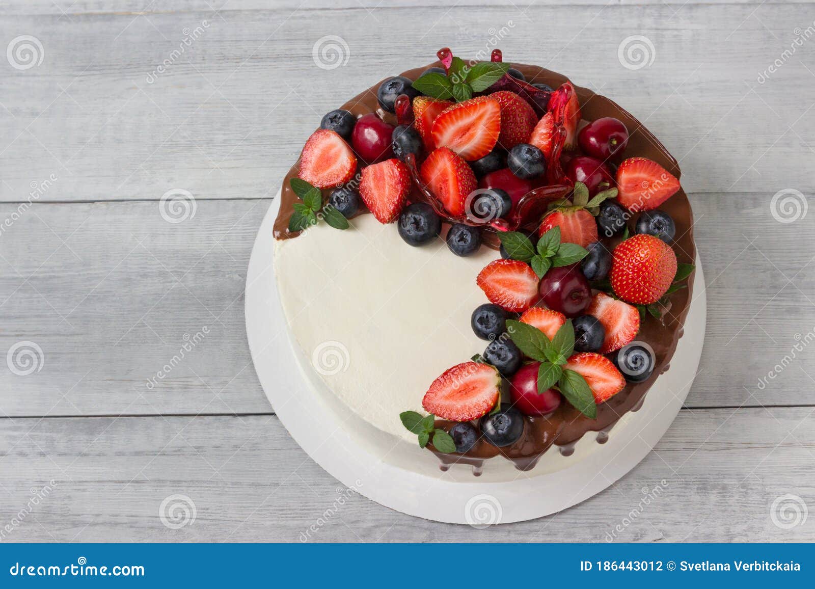 Sponge Cake with Chocolate Ganache and Fresh Fruits Stock Photo - Image ...