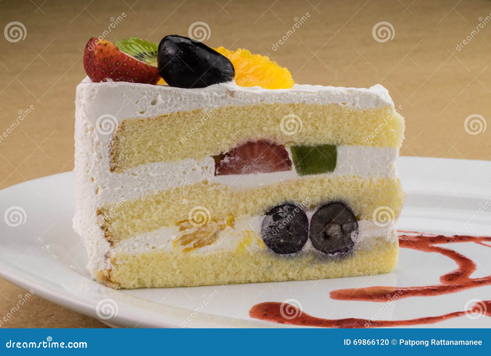 Sponge Cake with Mix Fruit and Whipped Cream. Stock Photo Image of