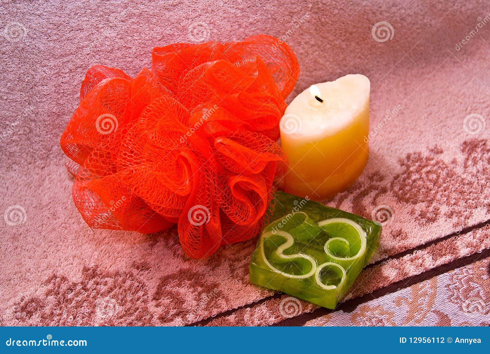 Sponge, soap and candle stock photo. Image of yellow 12956112