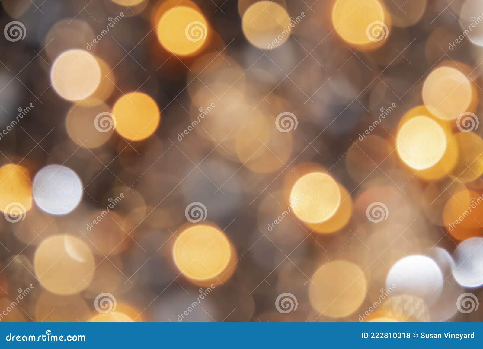 spooky smokey bokeh background in golds and oranges and browns