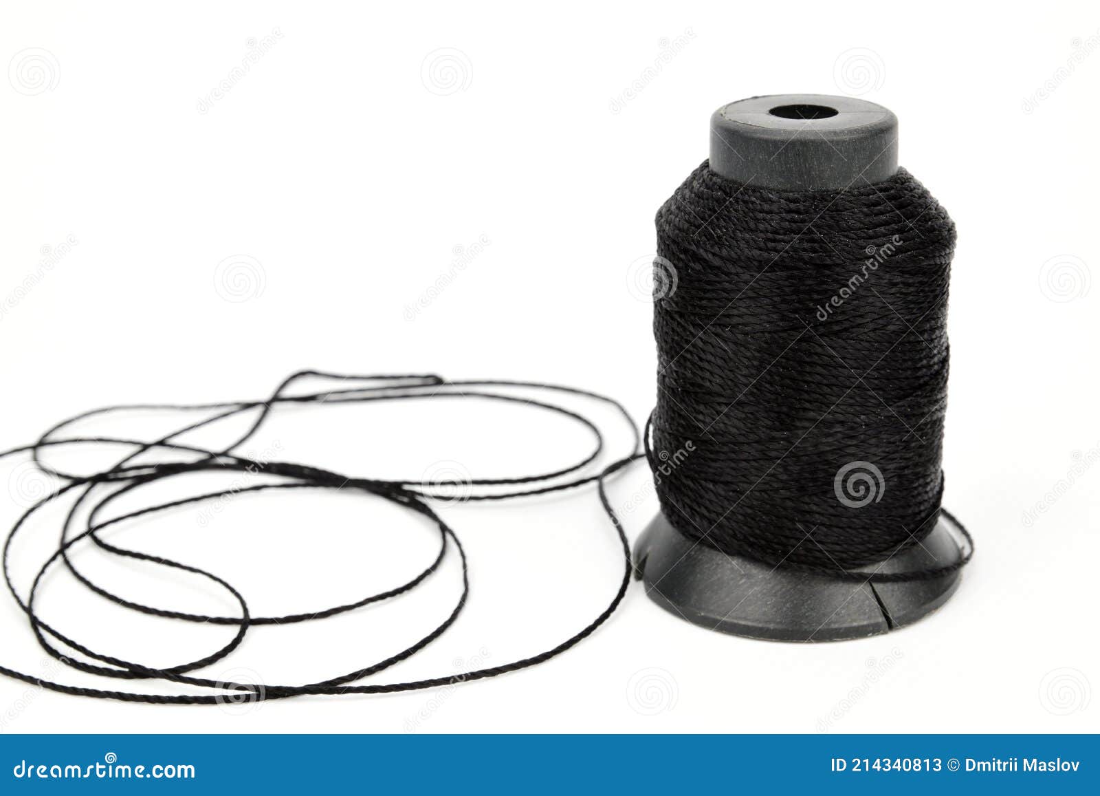 Spool of Black Nylon Thread. a Small Part of the Thread from the Spool Lies  Unrolled Nearby Stock Image - Image of spindle, tailor: 214340813