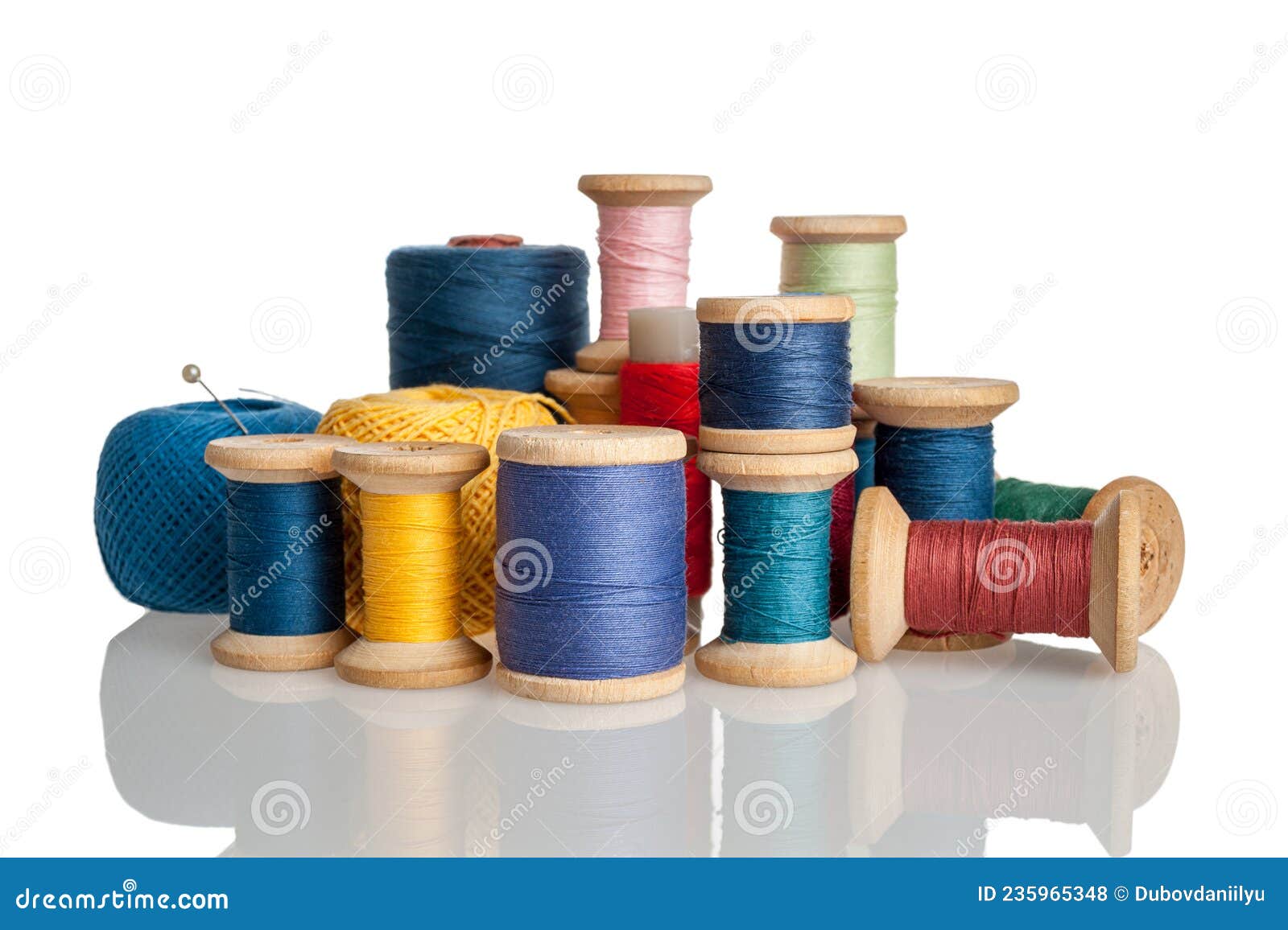 Spools of Thread, Bobbins with Threads of Different Colors and