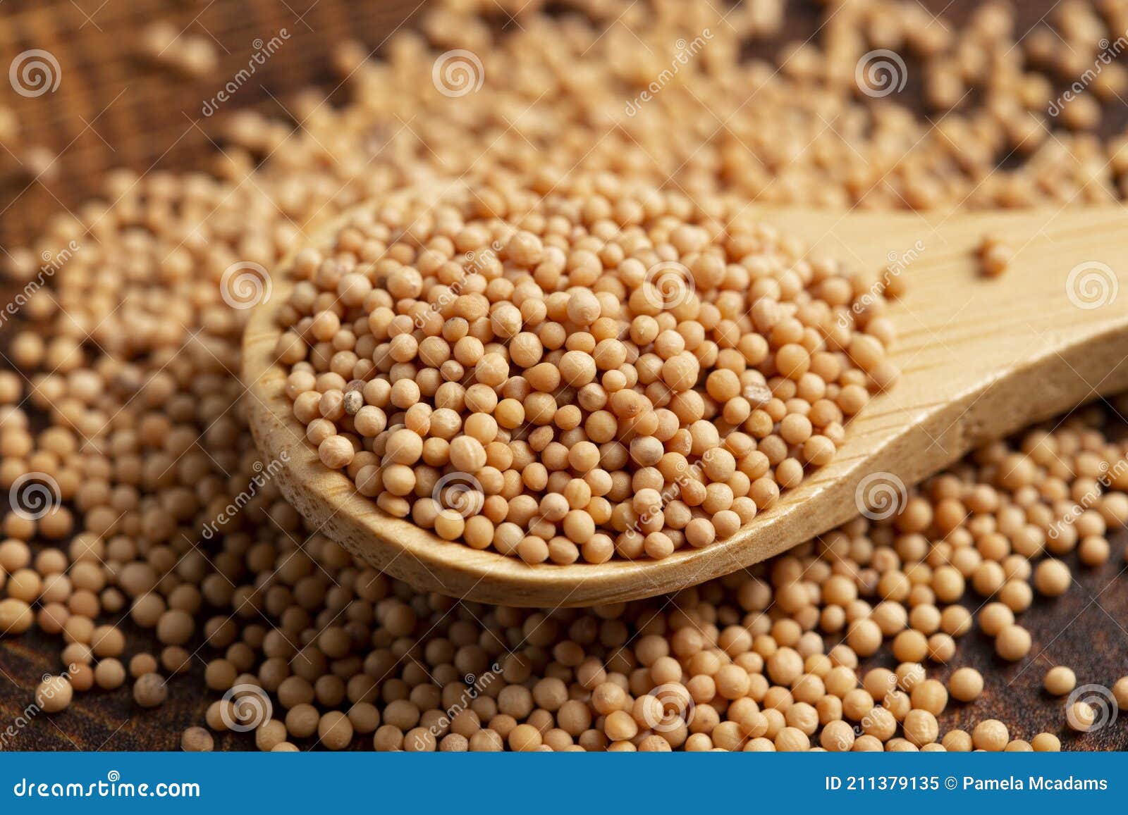 Spoon Full of Mustard Seeds on a Butcher Block Stock Image Image of