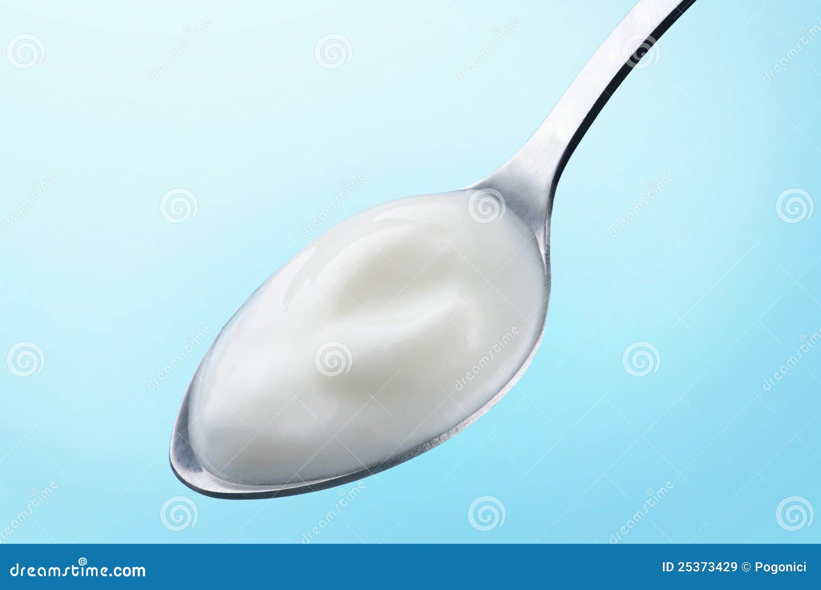 A spoon of natural yogurt stock image. Image of cooking 25373429