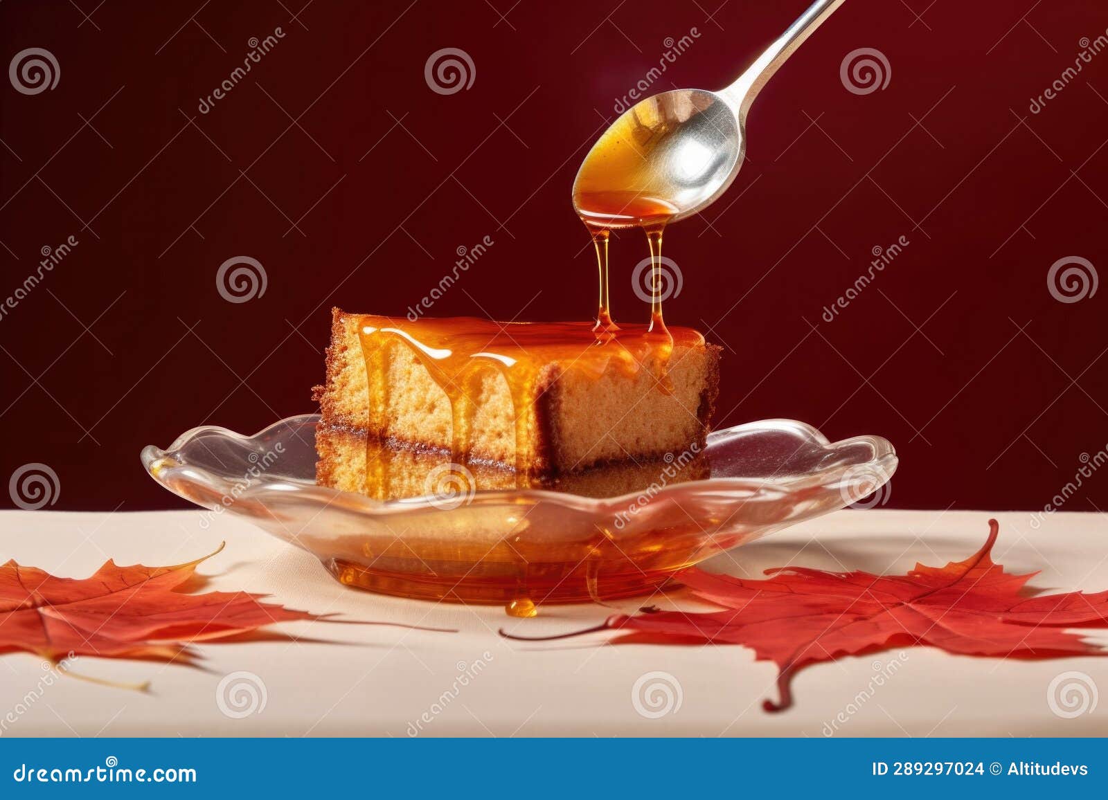 A Spoonful of Maple Syrup Dripping Onto a Cake Stock Photo Image of