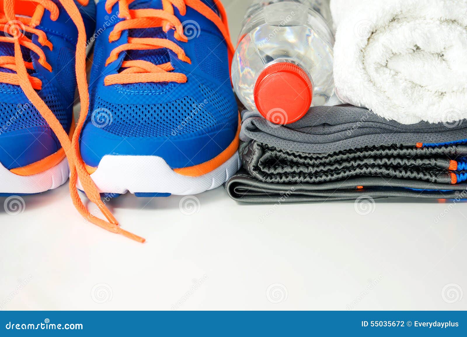 Sport Clothing and Shoes with Drinking Water Stock Photo - Image of ...