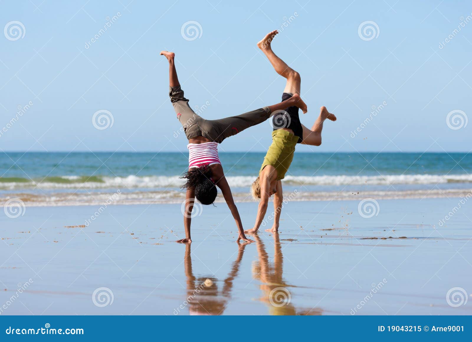 Sport Couple Doing Gymnastics On The Beach Stock Image Image Of Feet