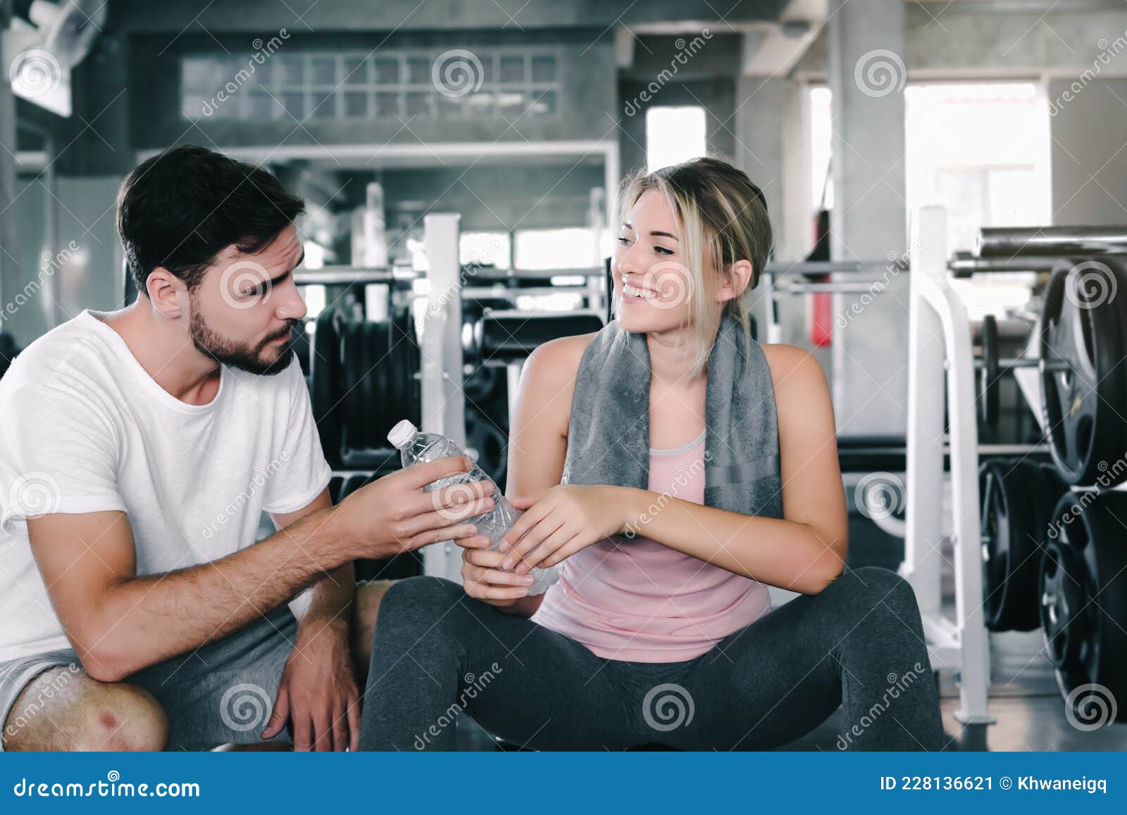 Sport Couple Love Sharing A Bottle Of Water Together After Exercised In