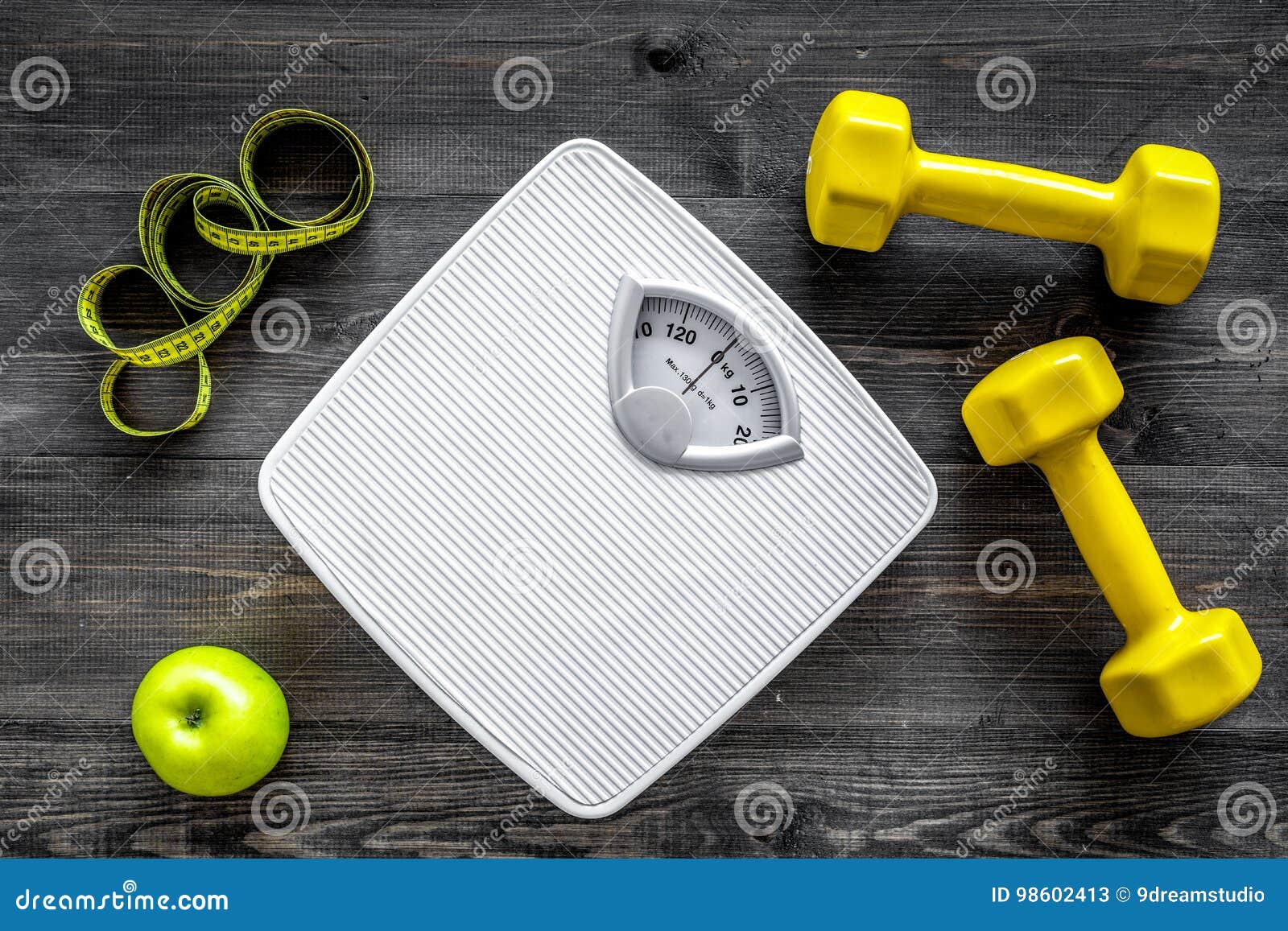 https://thumbs.dreamstime.com/z/sport-diet-losing-weight-bathroom-scale-apple-dumbbell-wooden-background-top-view-98602413.jpg