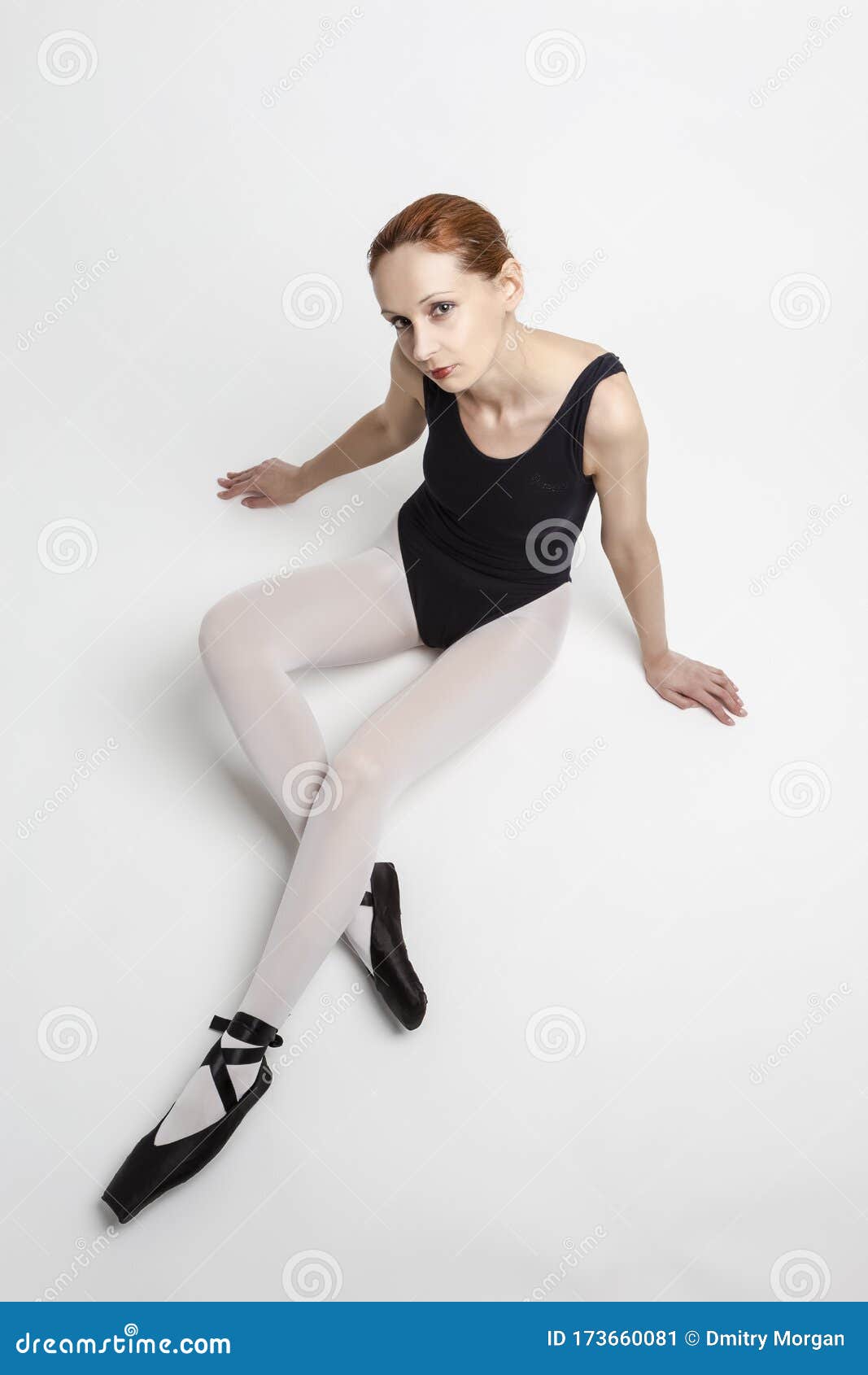 Sport Ideas. Relaxing and Dreaming Caucasian Professional Ballet Dancer in Body Suit and Pointes Shoes Against White Stock Image - Image of ballerina, entertainment: 173660081