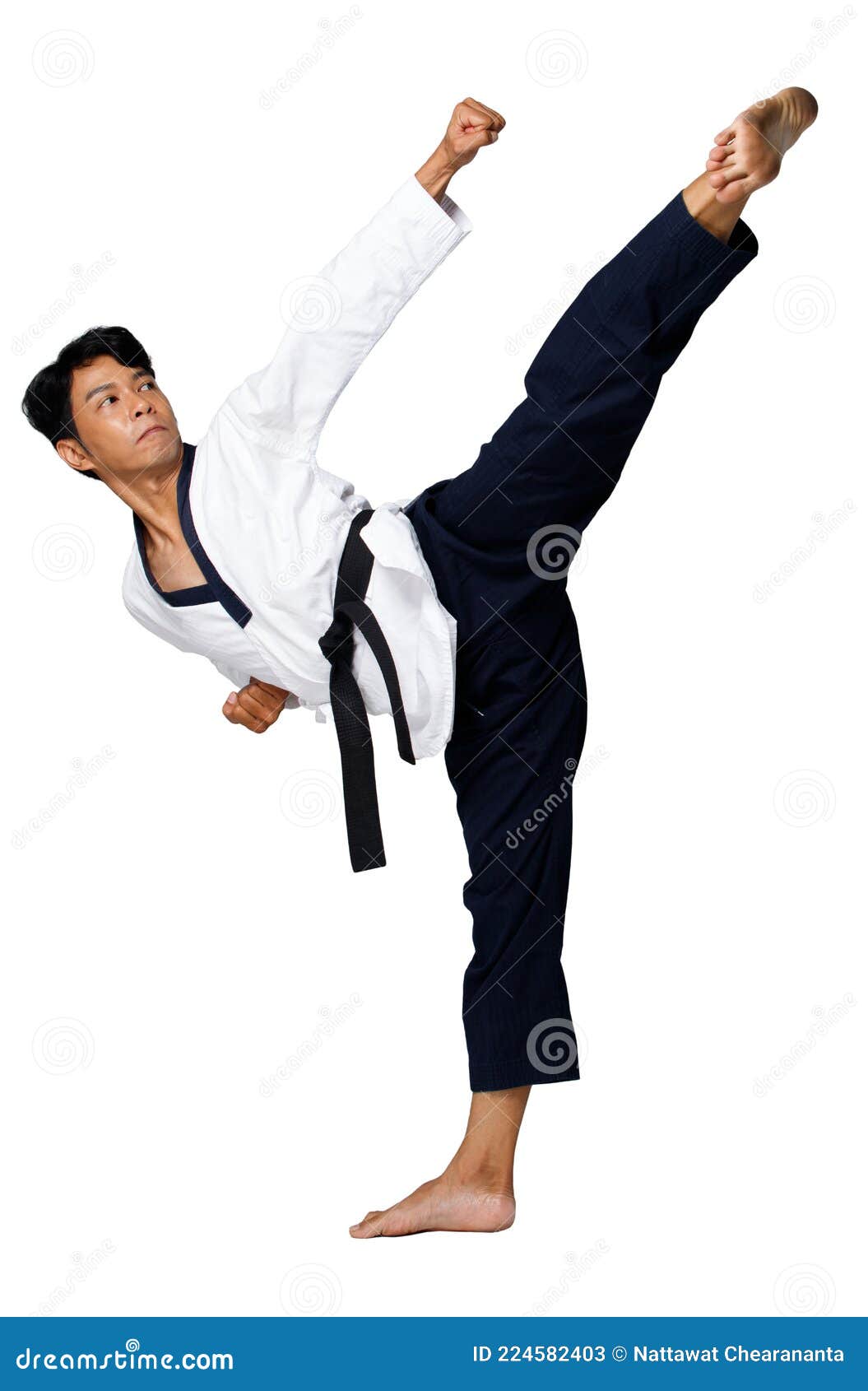 Premium Vector | A man is kicking a karate pose with a black background.