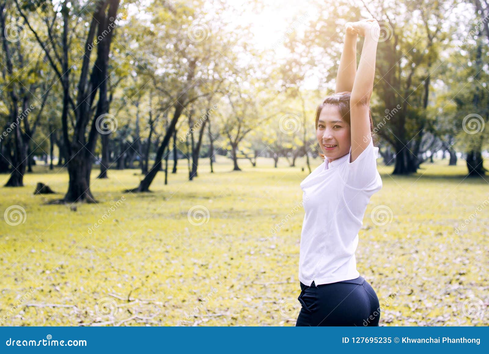 Sport Woman Exercise and Worm Up in Park in Morning Stock Image - Image ...