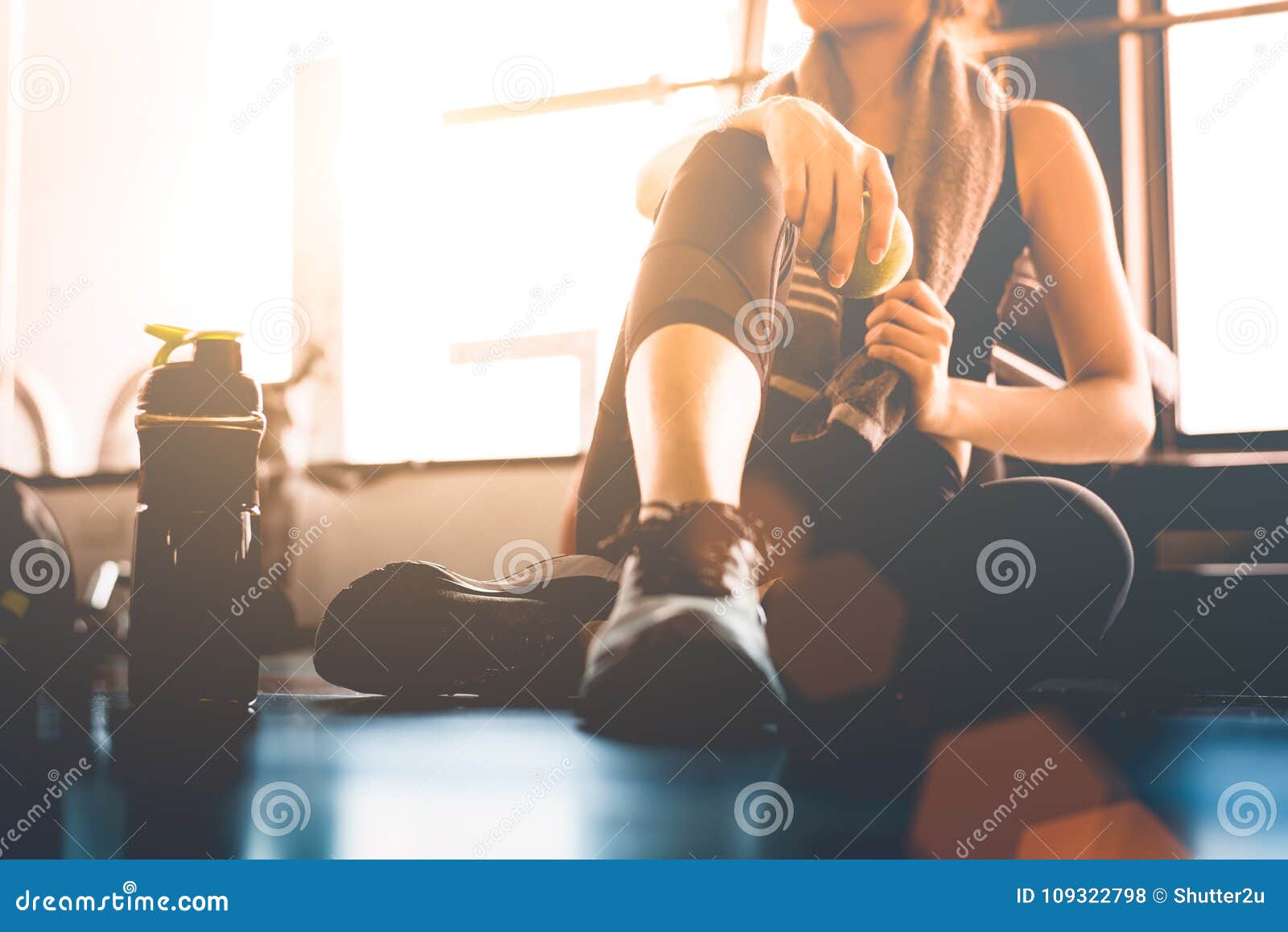 sport woman sitting and resting after workout or exercise in fit